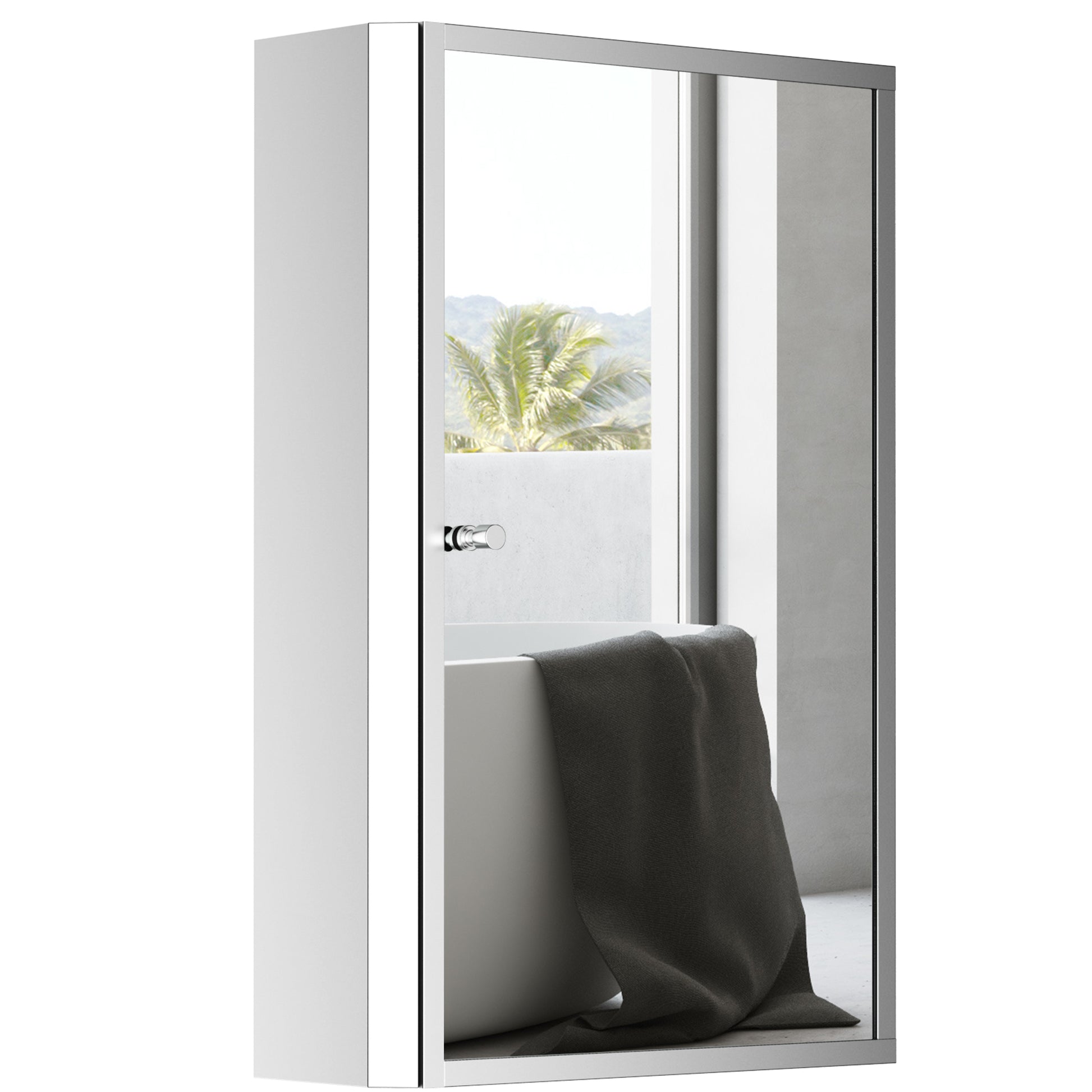 Modern white medicine cabinet with mirrored door reflecting a bathtub and tropical foliage
