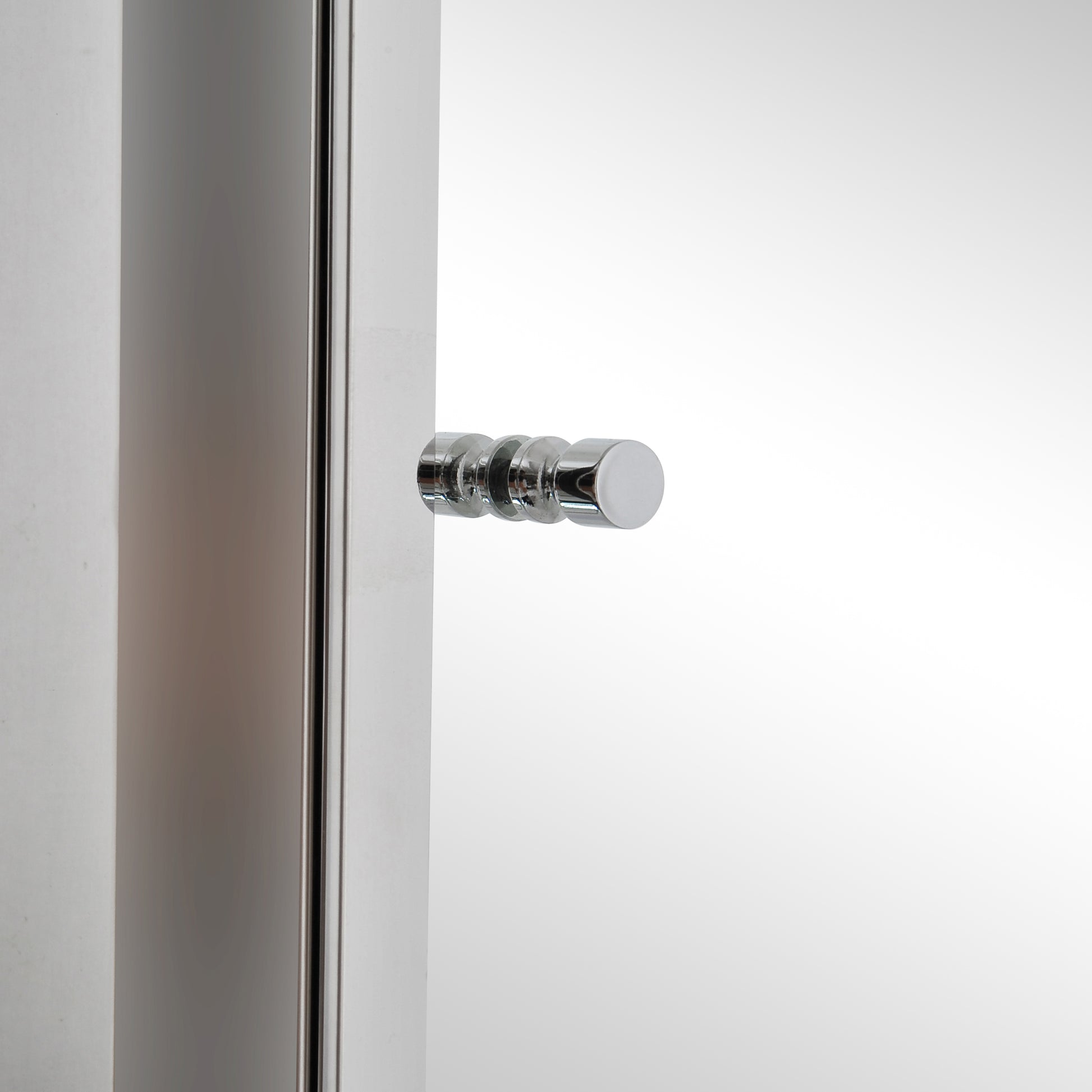 Polished chrome shower door handle with ribbed design and modern aesthetic