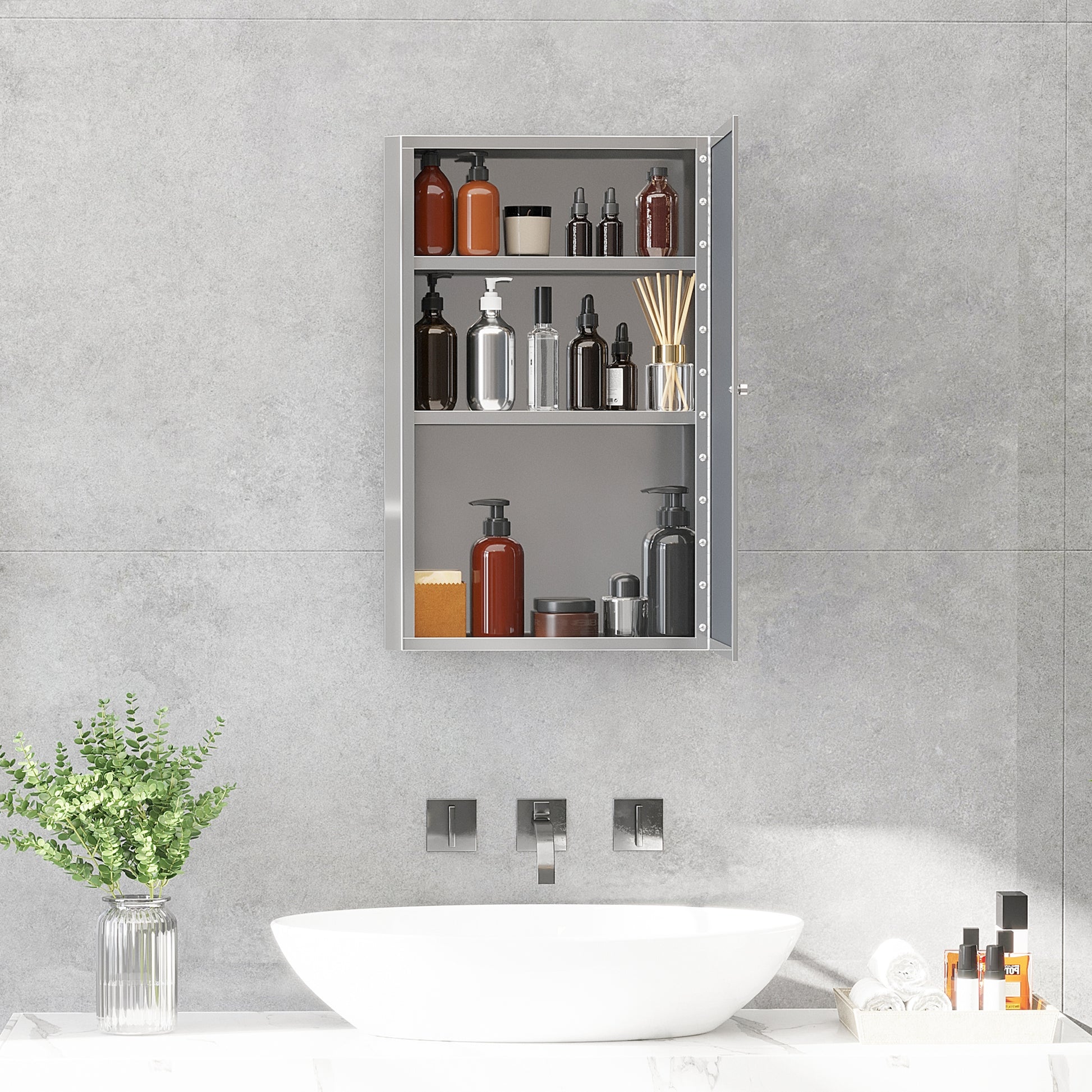 Open stainless steel medicine cabinet filled with amber and clear dispenser bottles