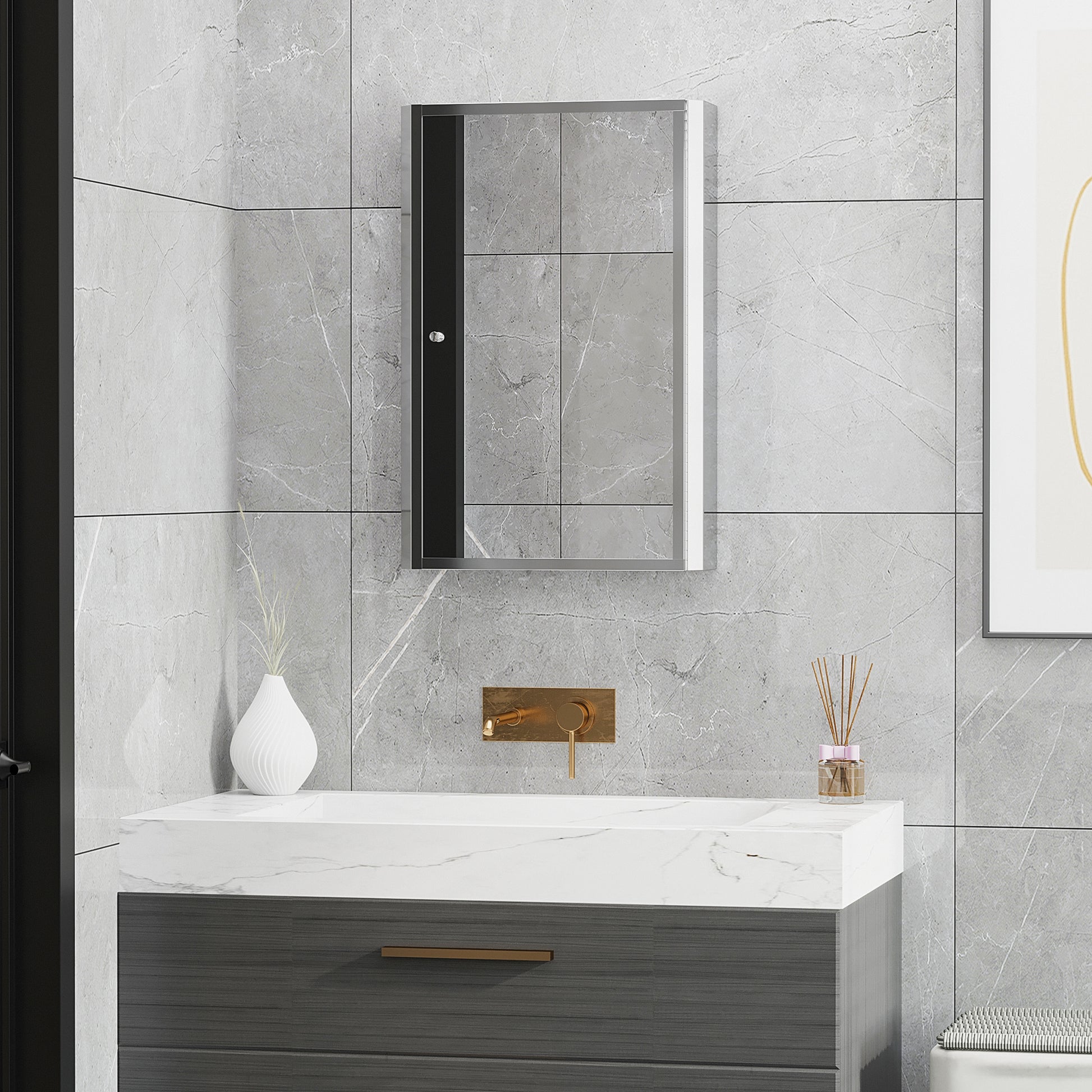 Modern gray medicine cabinet with mirrored doors and a single chrome handle
