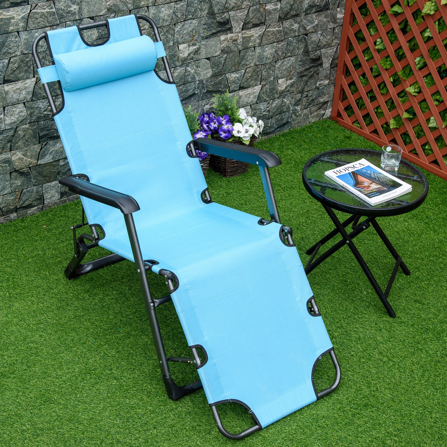 Blue adjustable folding lounge chair with padded headrest ideal for patio relaxation