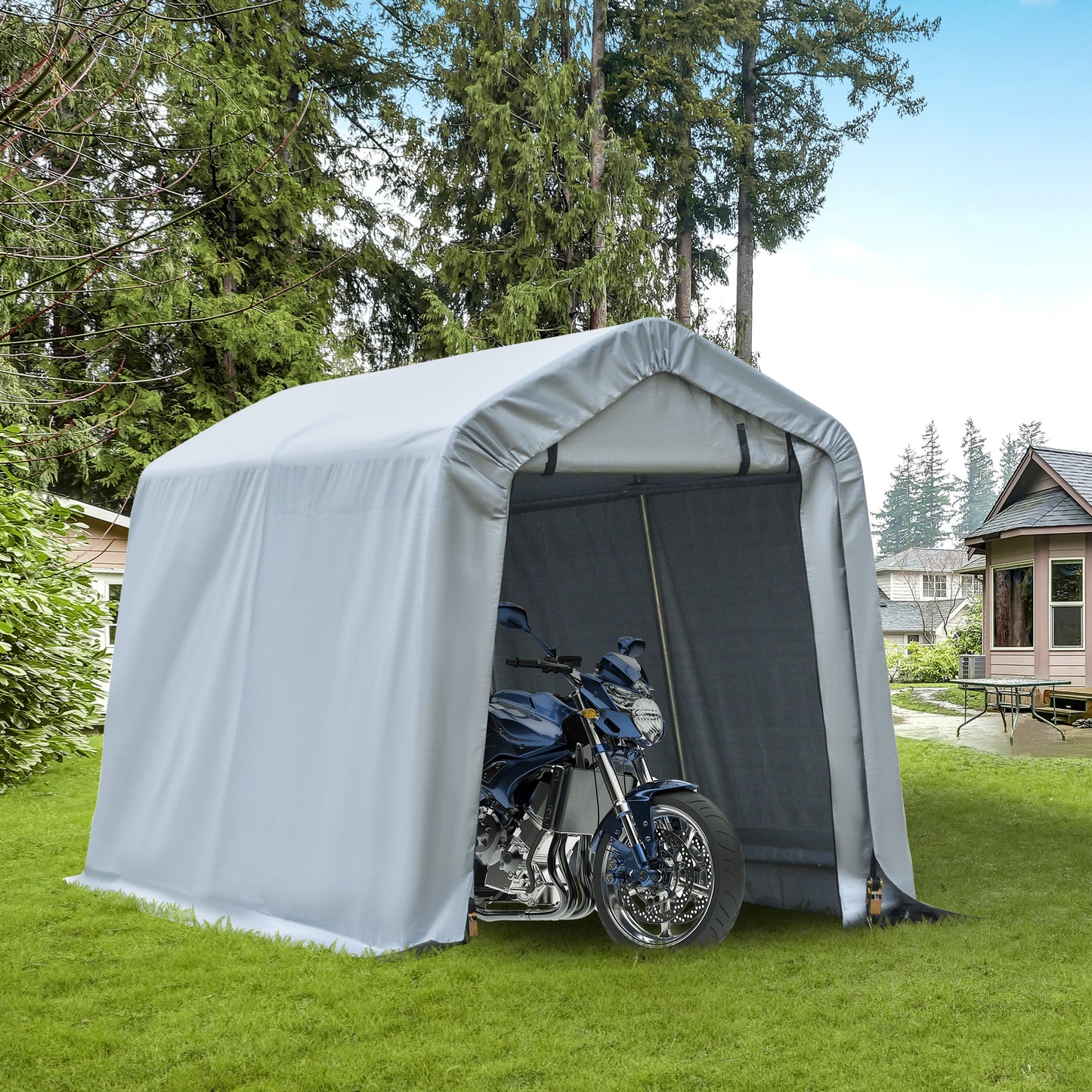 Gray portable garage shelter housing a blue sport motorcycle outdoors