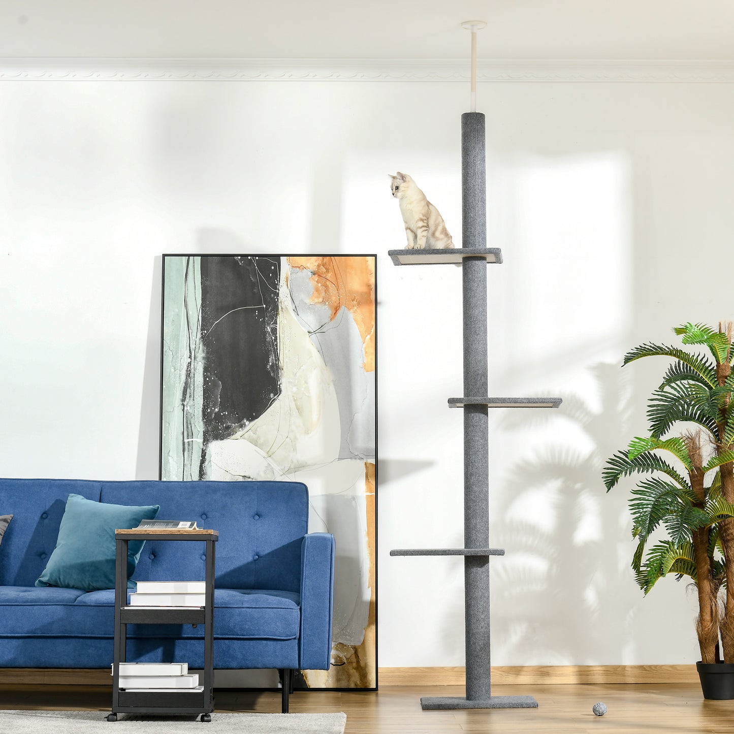Tall grey cat tree with multiple platforms designed for active cats