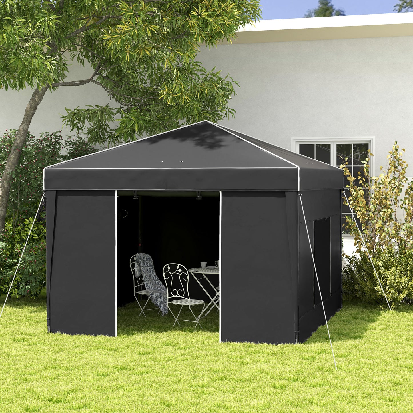 Black outdoor gazebo with white trim perfect for garden gatherings