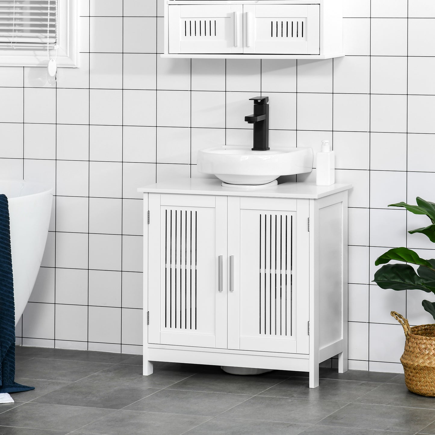White wooden vanity with slatted doors and modern black faucet for bathroom storage