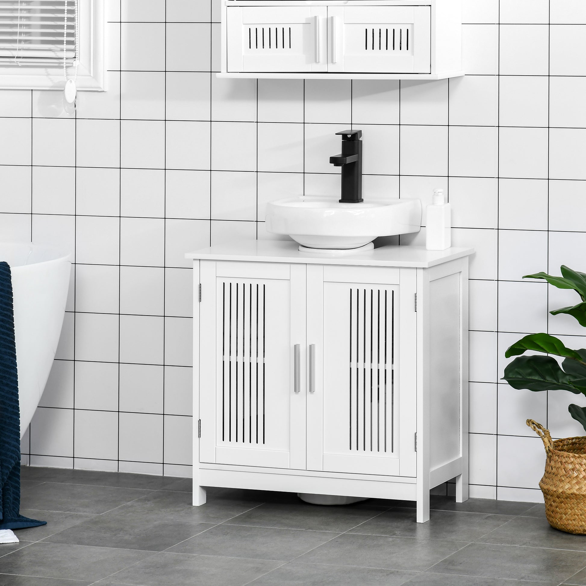 White wooden vanity with slatted doors and modern black faucet for bathroom storage