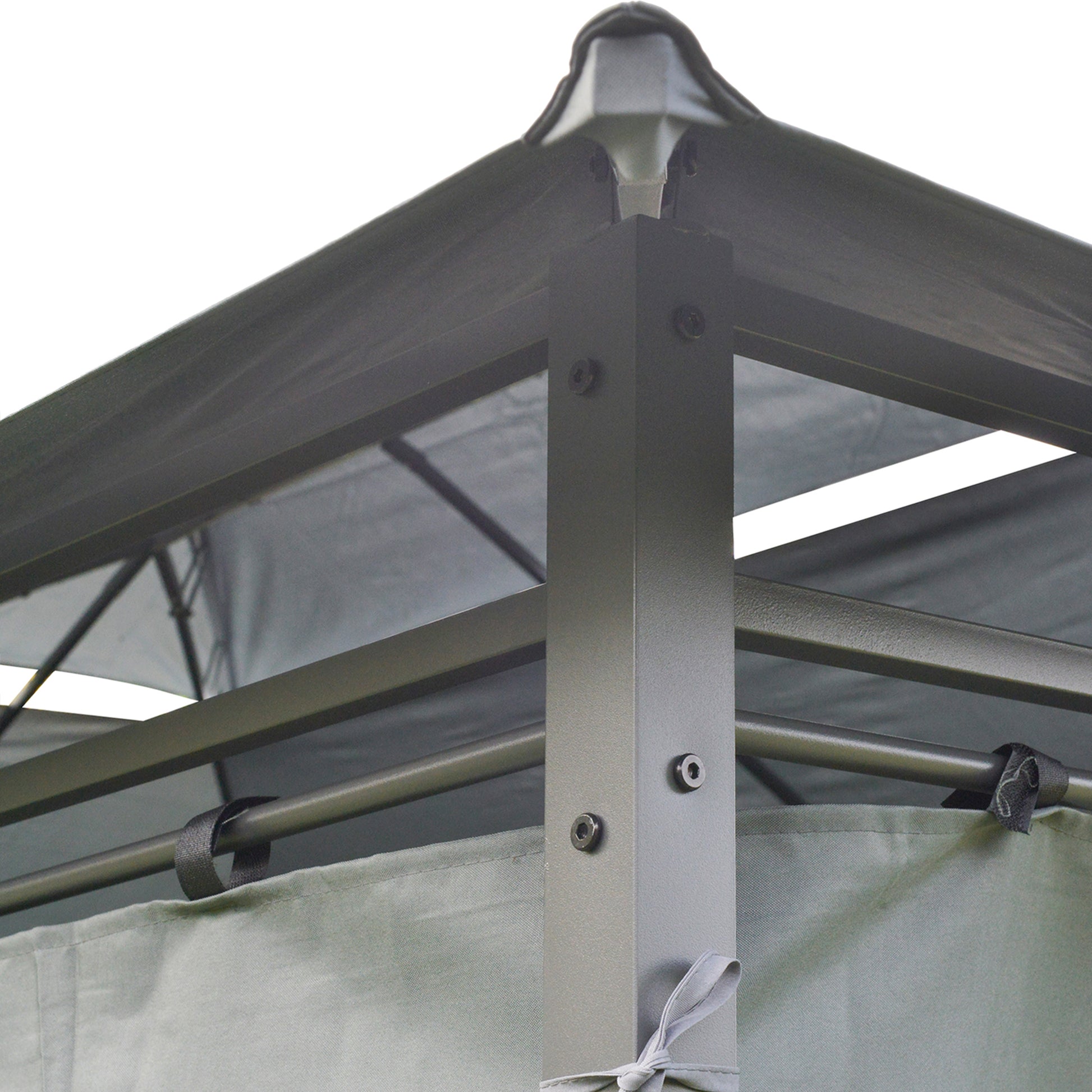 Closeup of a dark grey metal gazebo frame with a black canopy and grey side panels