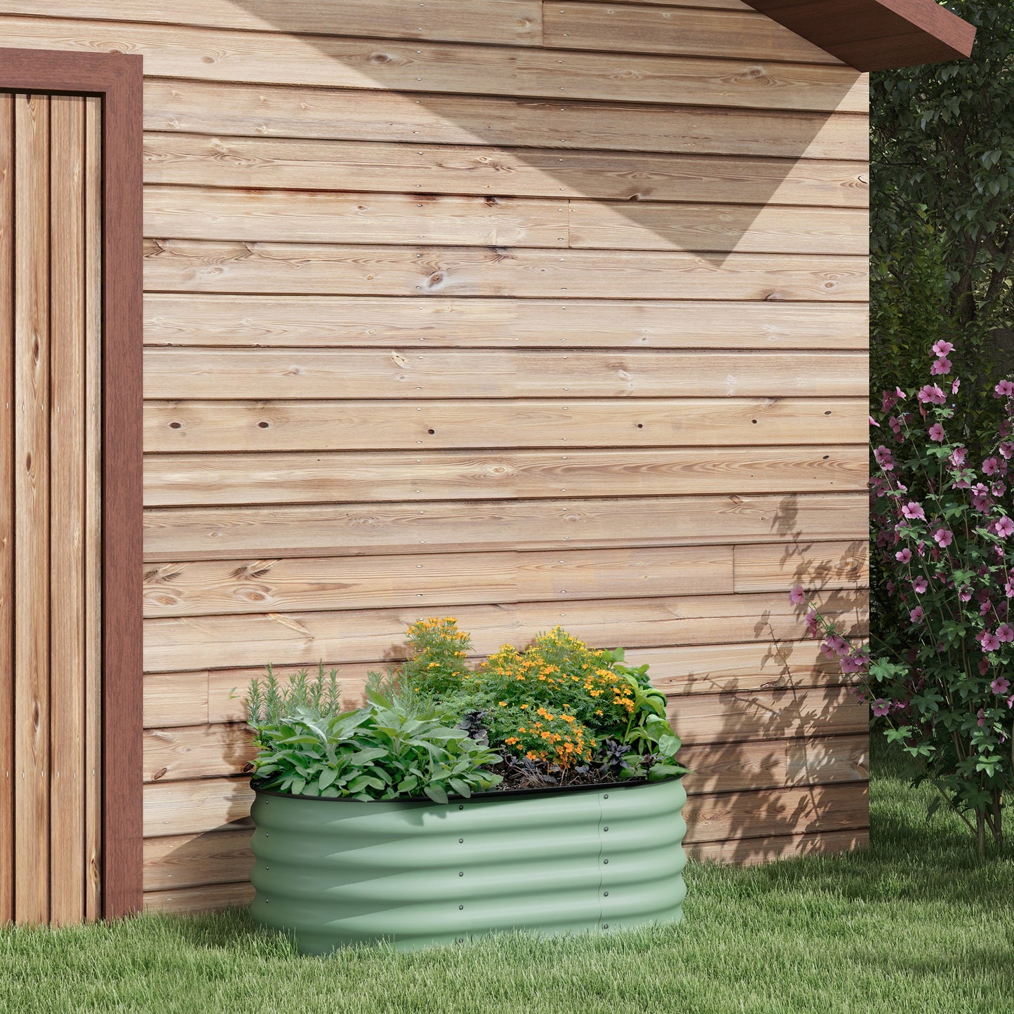 Sage rosemary and marigolds flourish in a light green corrugated metal garden bed
