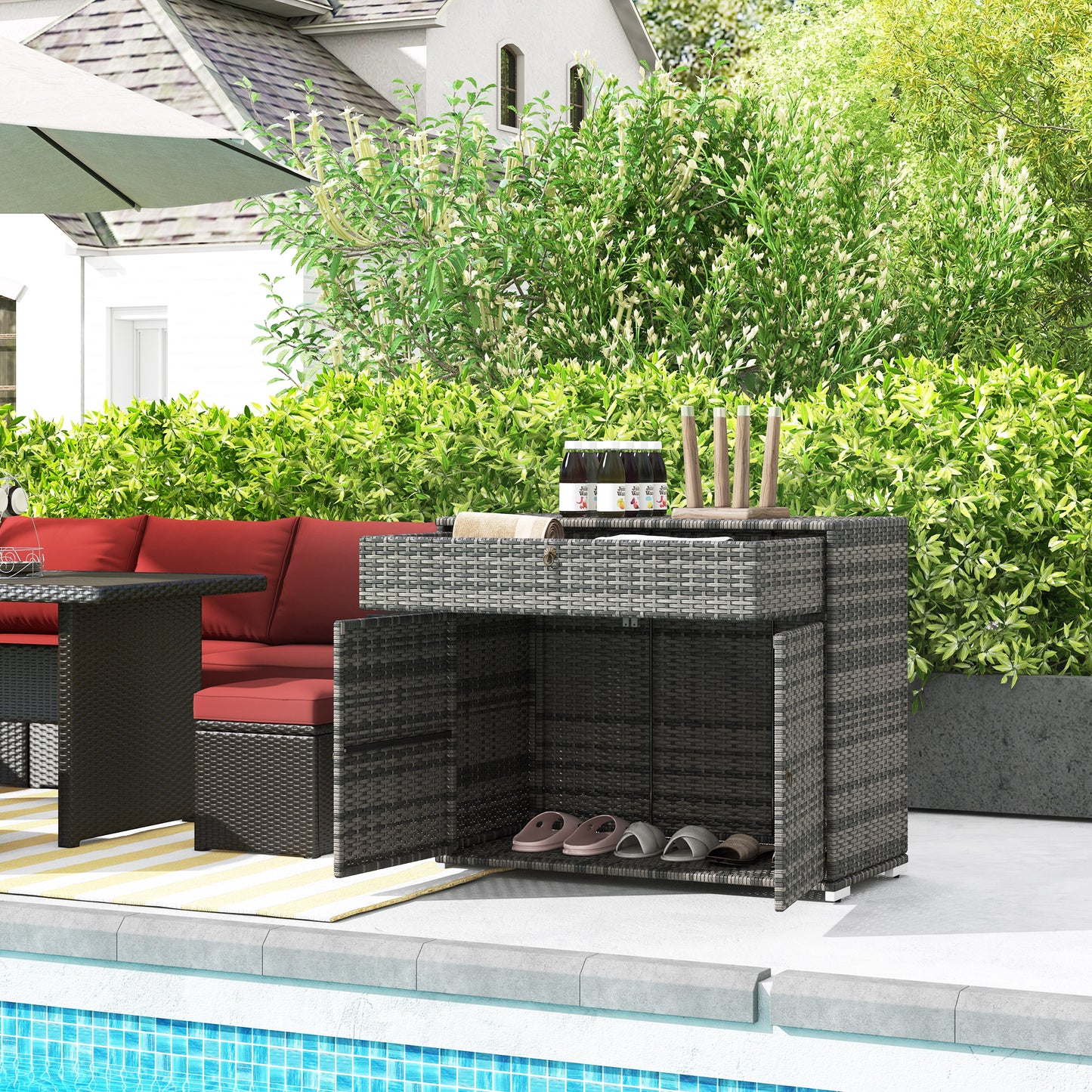 Grey wicker outdoor storage cabinet with open doors storing sandals