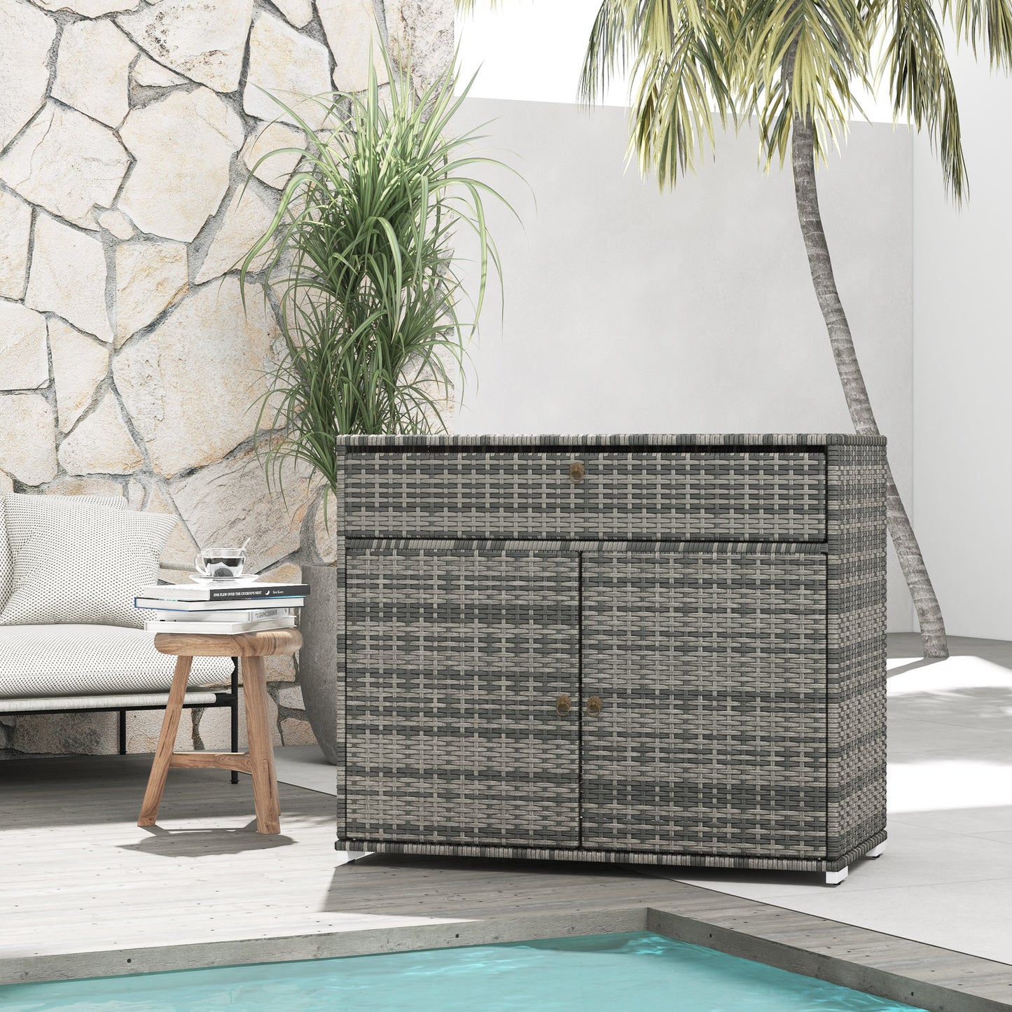 Gray wicker patio storage cabinet with double doors and a drawer