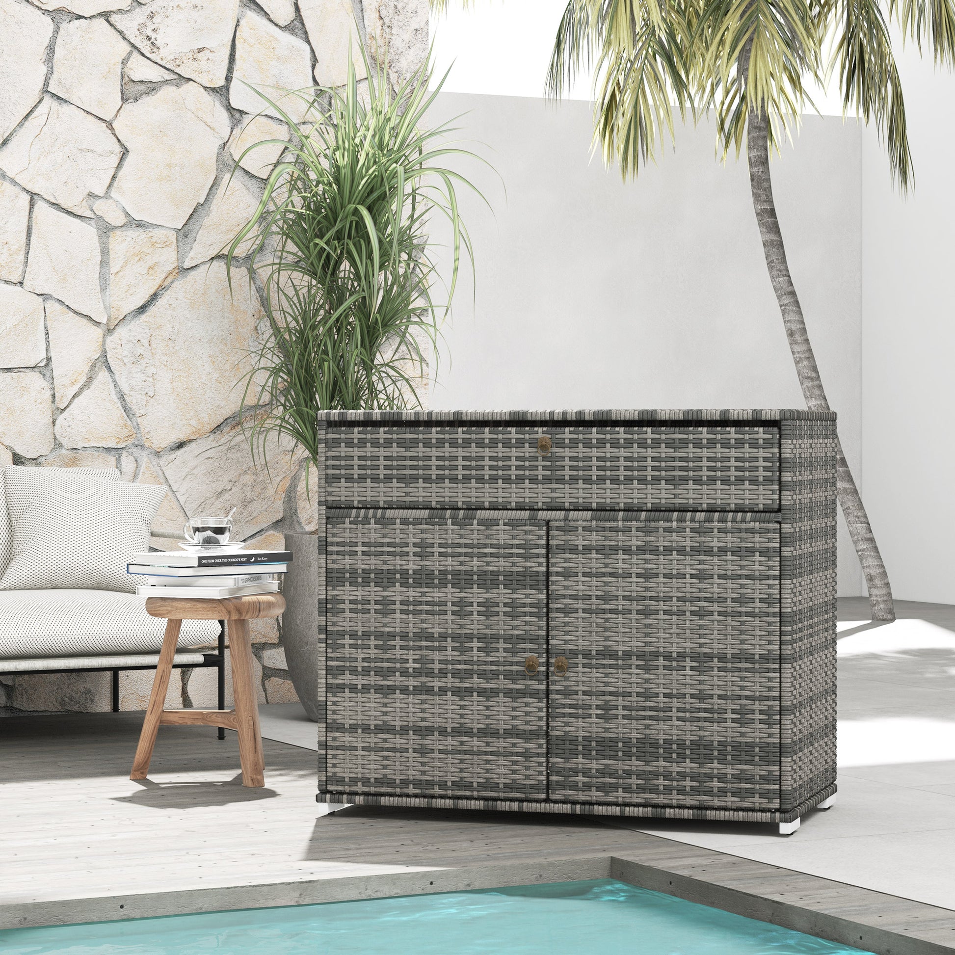 Gray wicker patio storage cabinet with double doors and a drawer