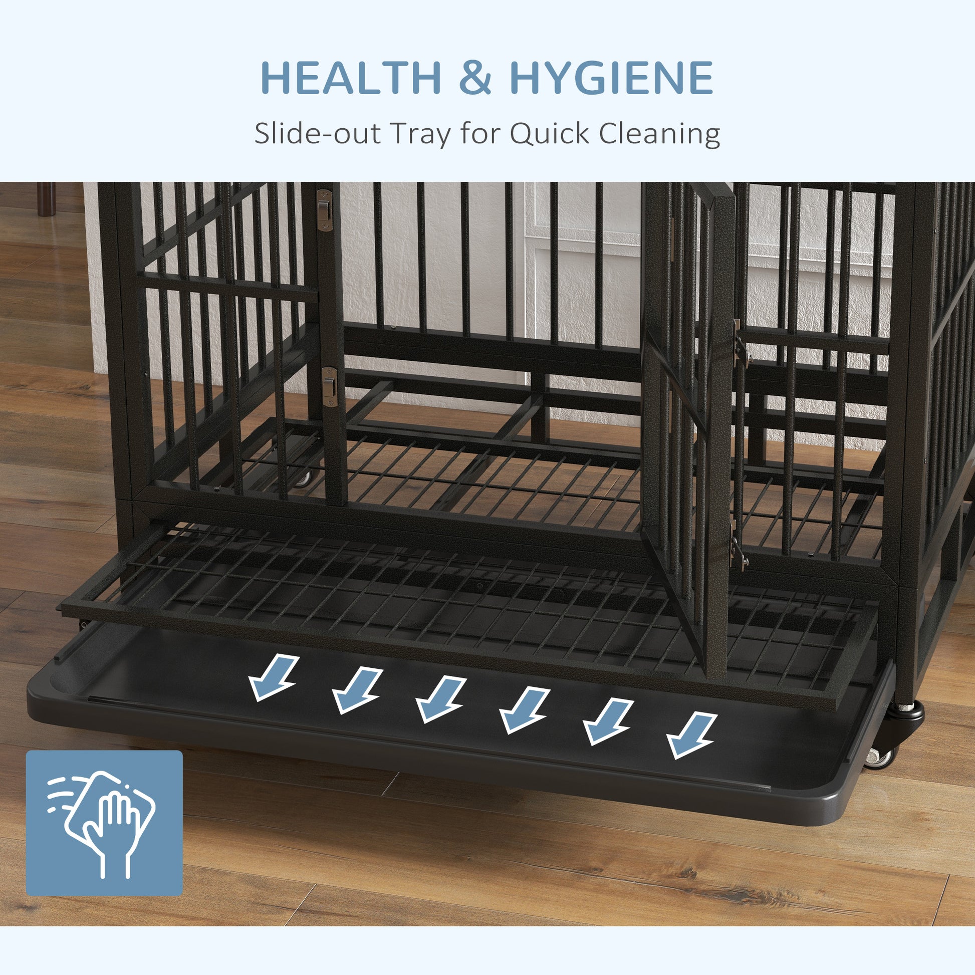 Black metal dog crate with a removable slideout tray for easy cleaning
