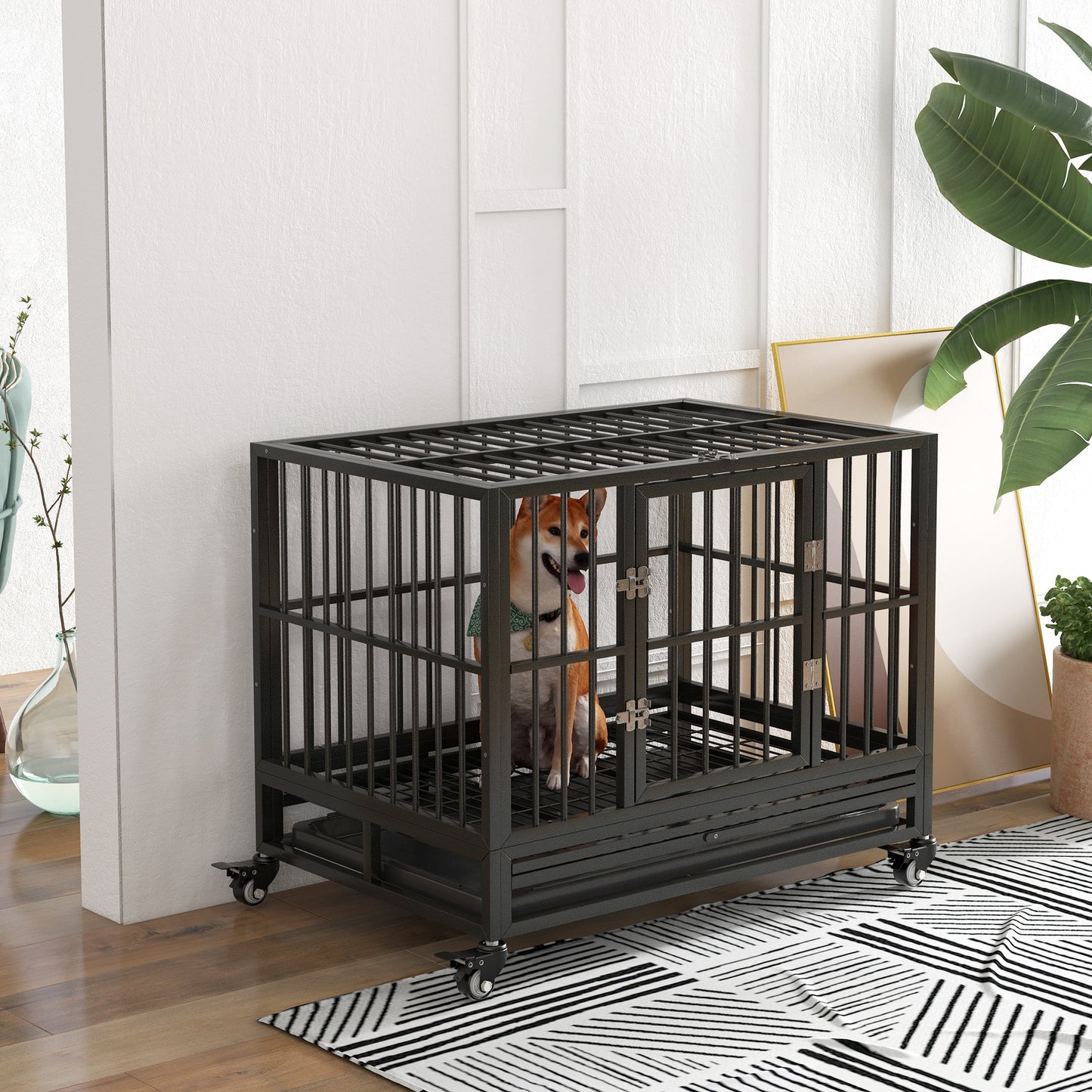 Durable black metal dog crate with a sliding tray and locking casters ideal for medium breeds