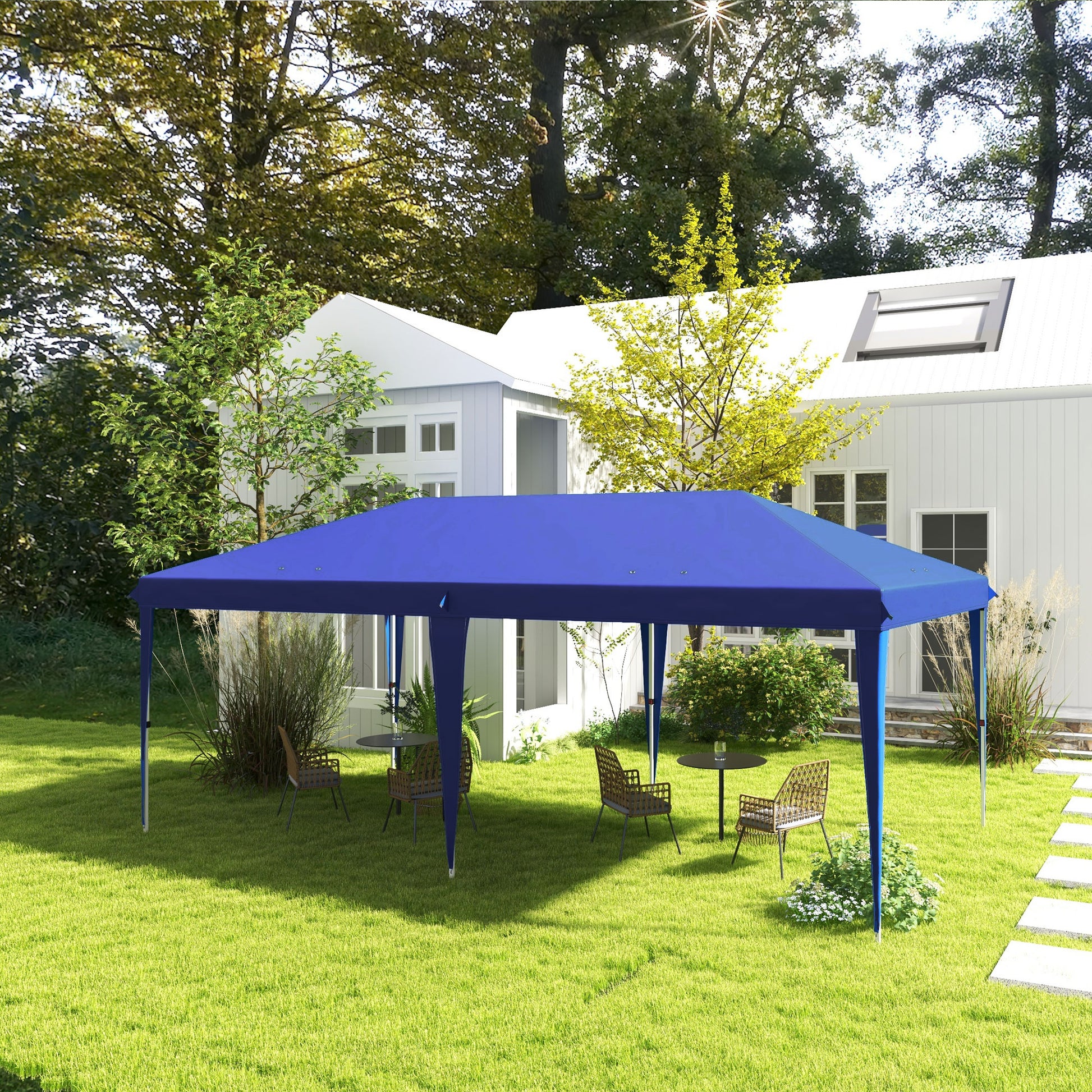 Blue outdoor canopy tent with metal frame set up in a grassy backyard with chairs and tables