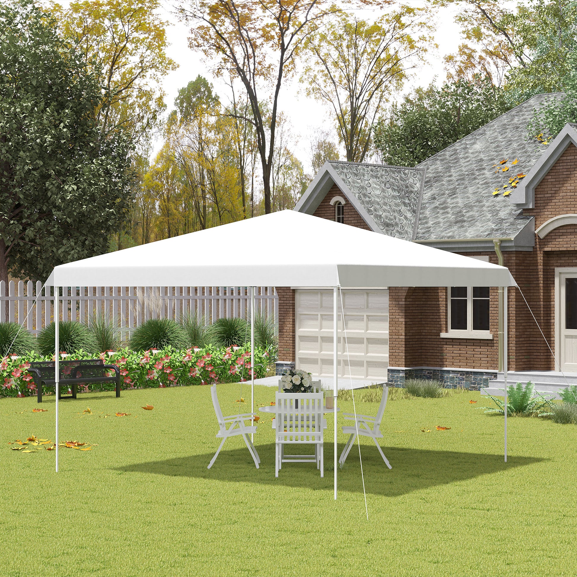 White canopy tent set up on grassy lawn with outdoor furniture and house in background