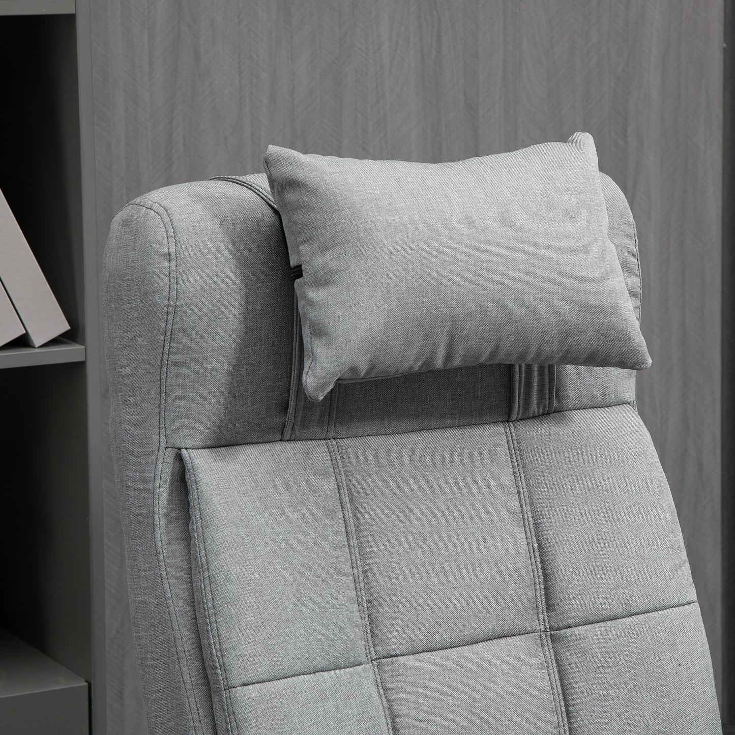 Gray fabric office chair with adjustable headrest for comfortable seating
