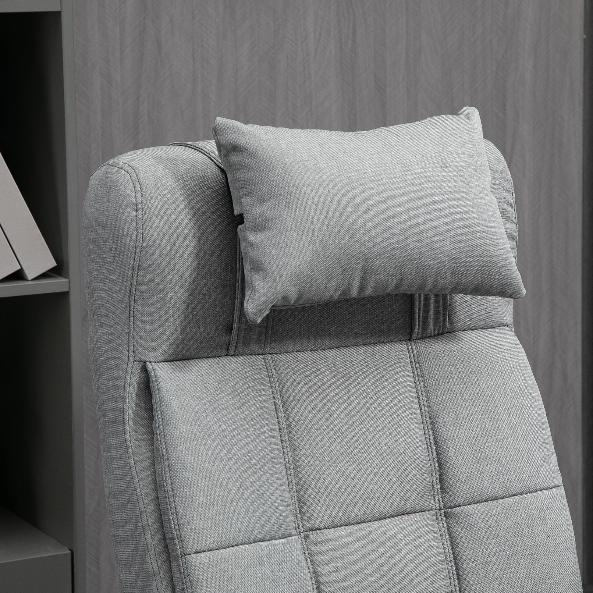 Gray fabric office chair with adjustable headrest for comfortable seating