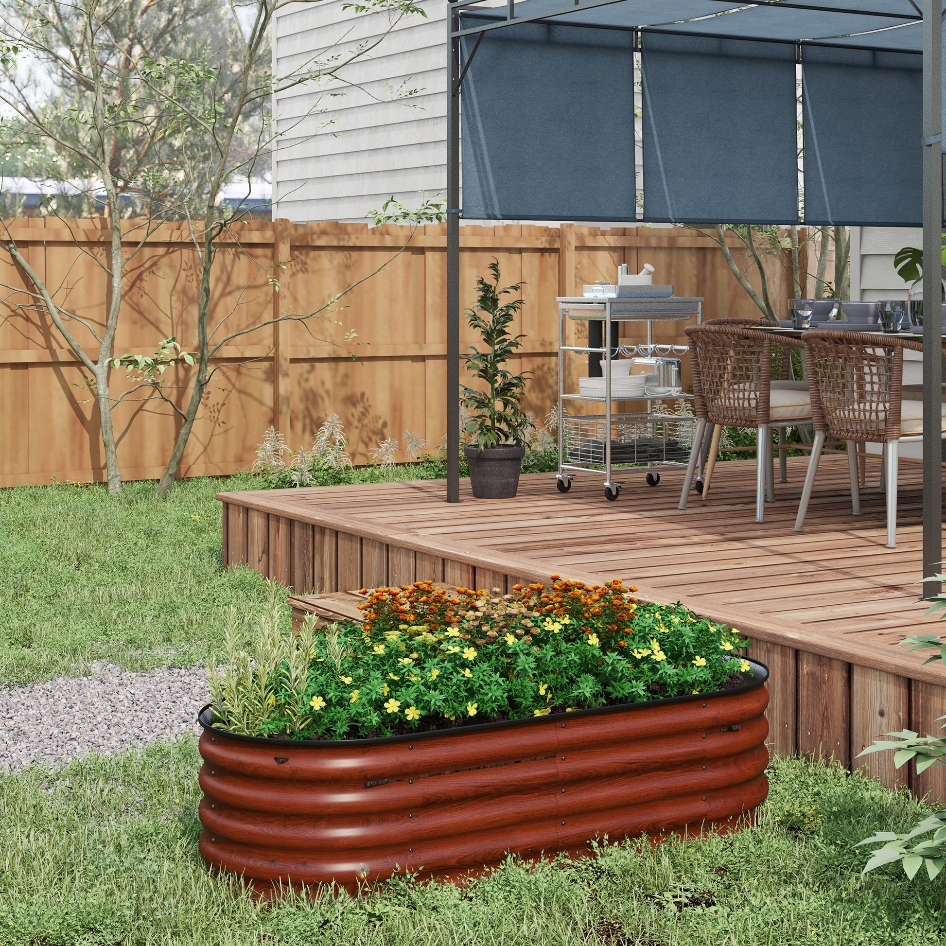 Brown corrugated raised garden bed filled with blooming flowers and herbs