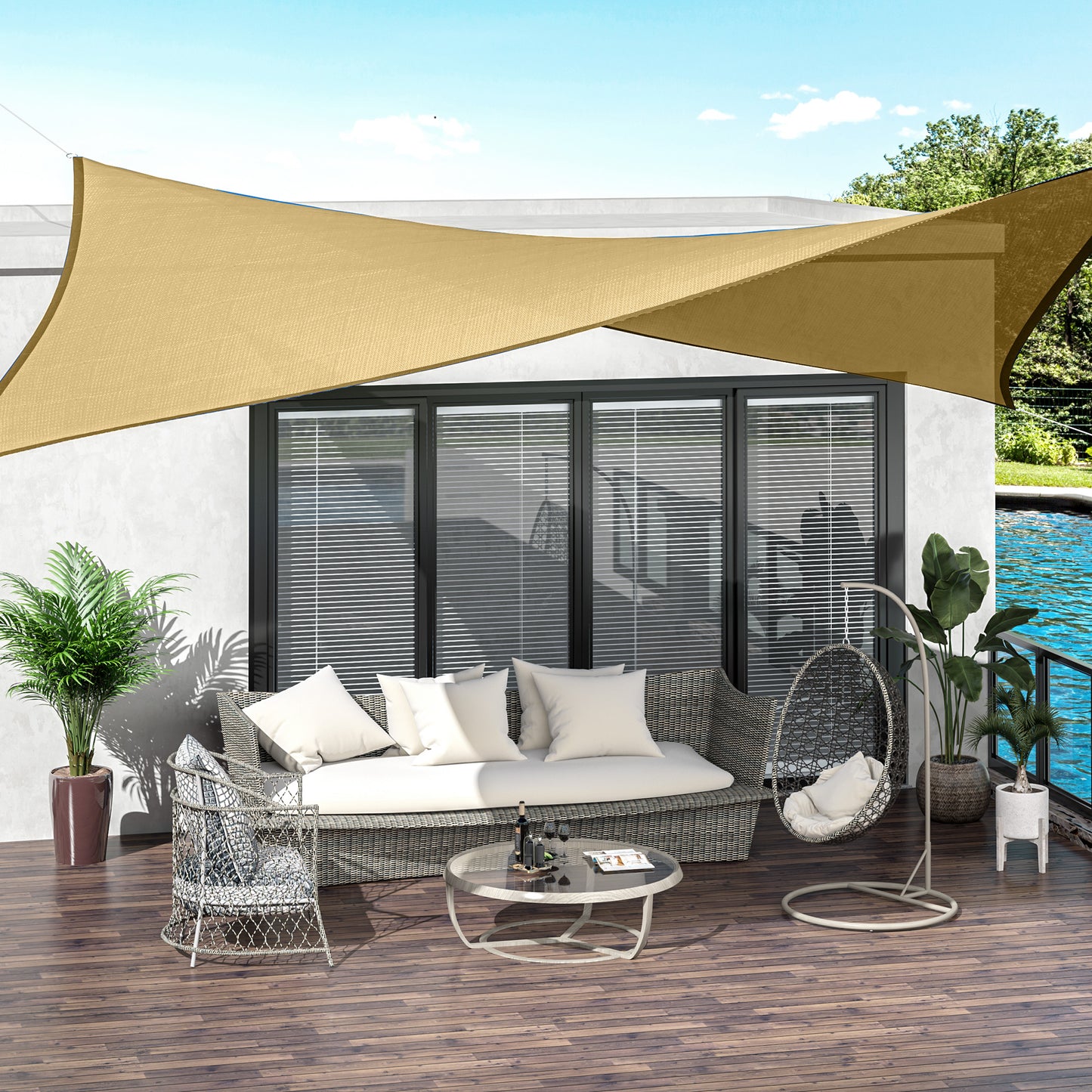 Beige triangular shade sail providing UV protection over a patio seating area