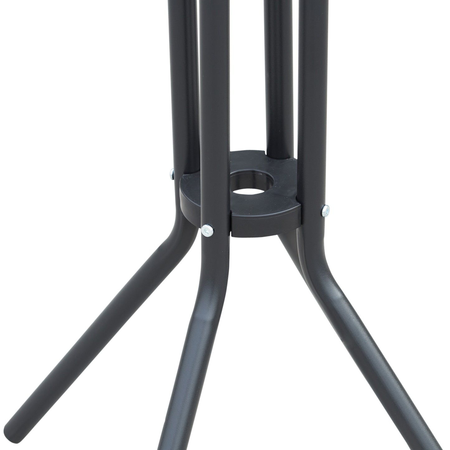 Close up of black metal table legs with a circular support