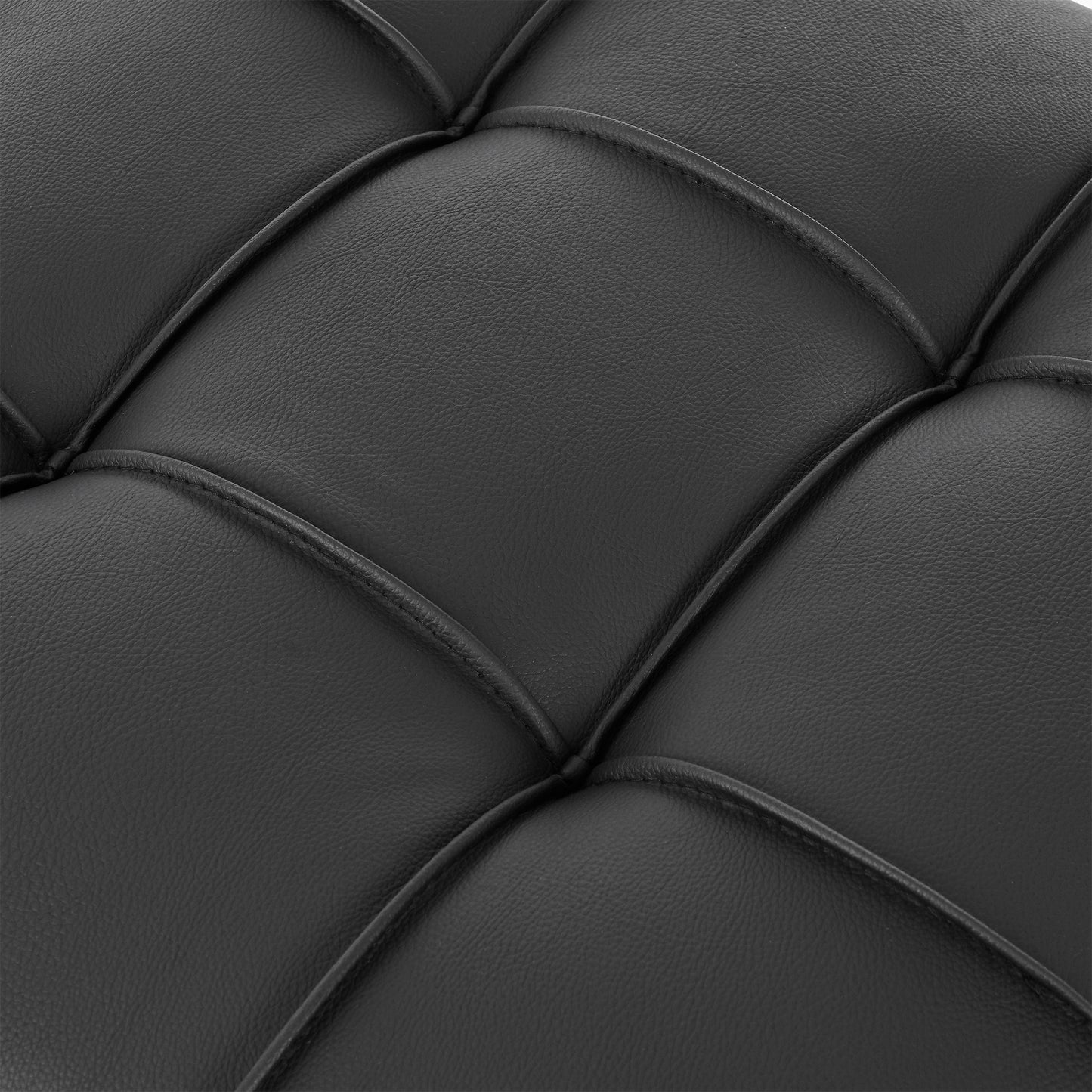 Closeup of black faux leather upholstery with diamond tufting ideal for furniture