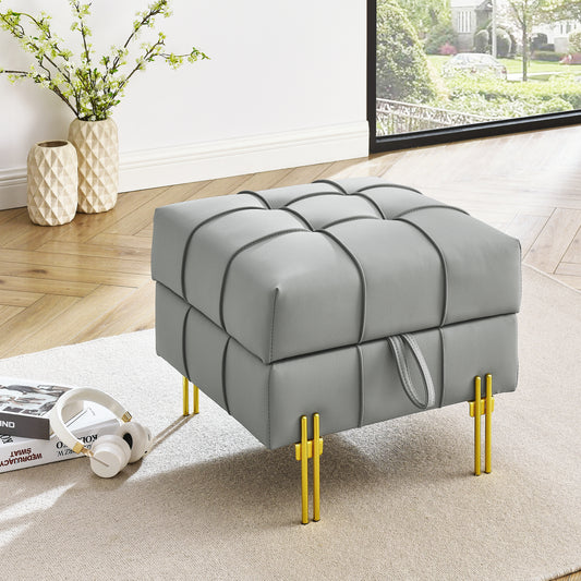 Grey faux leather tufted ottoman with gold legs ideal for living room decor