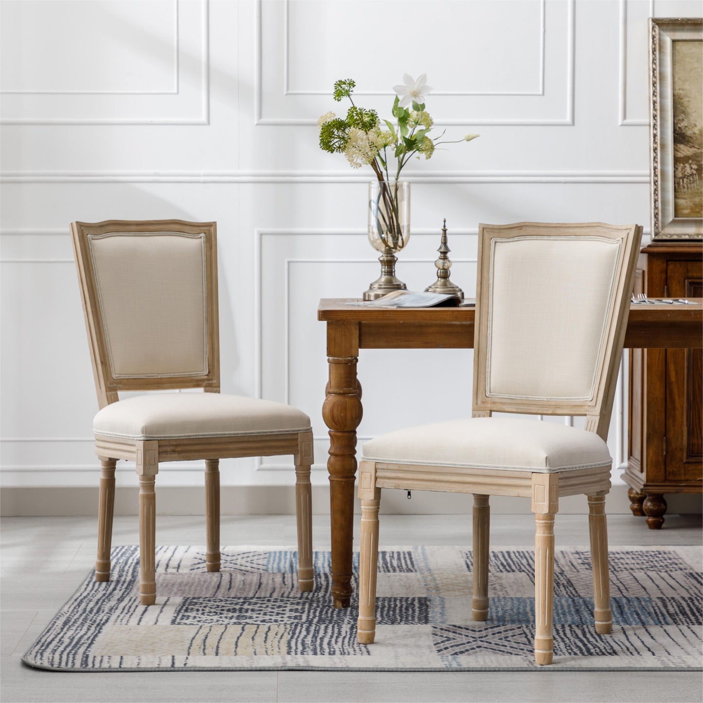French country dining chair with upholstered cream seat and light wood frame