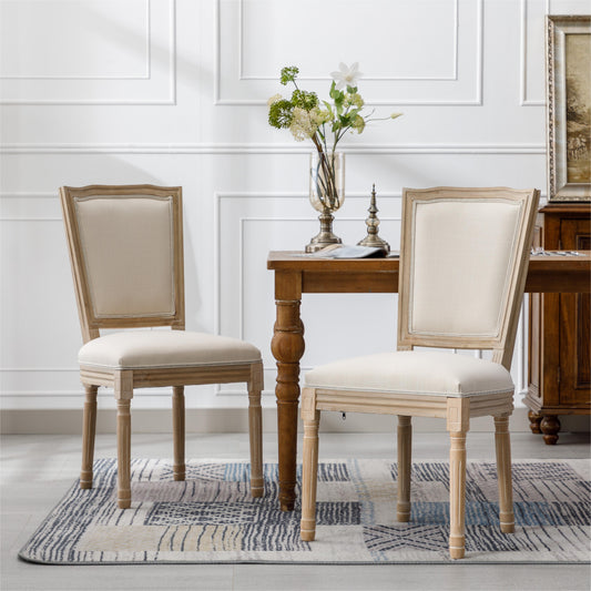 French country dining chair with upholstered cream seat and light wood frame