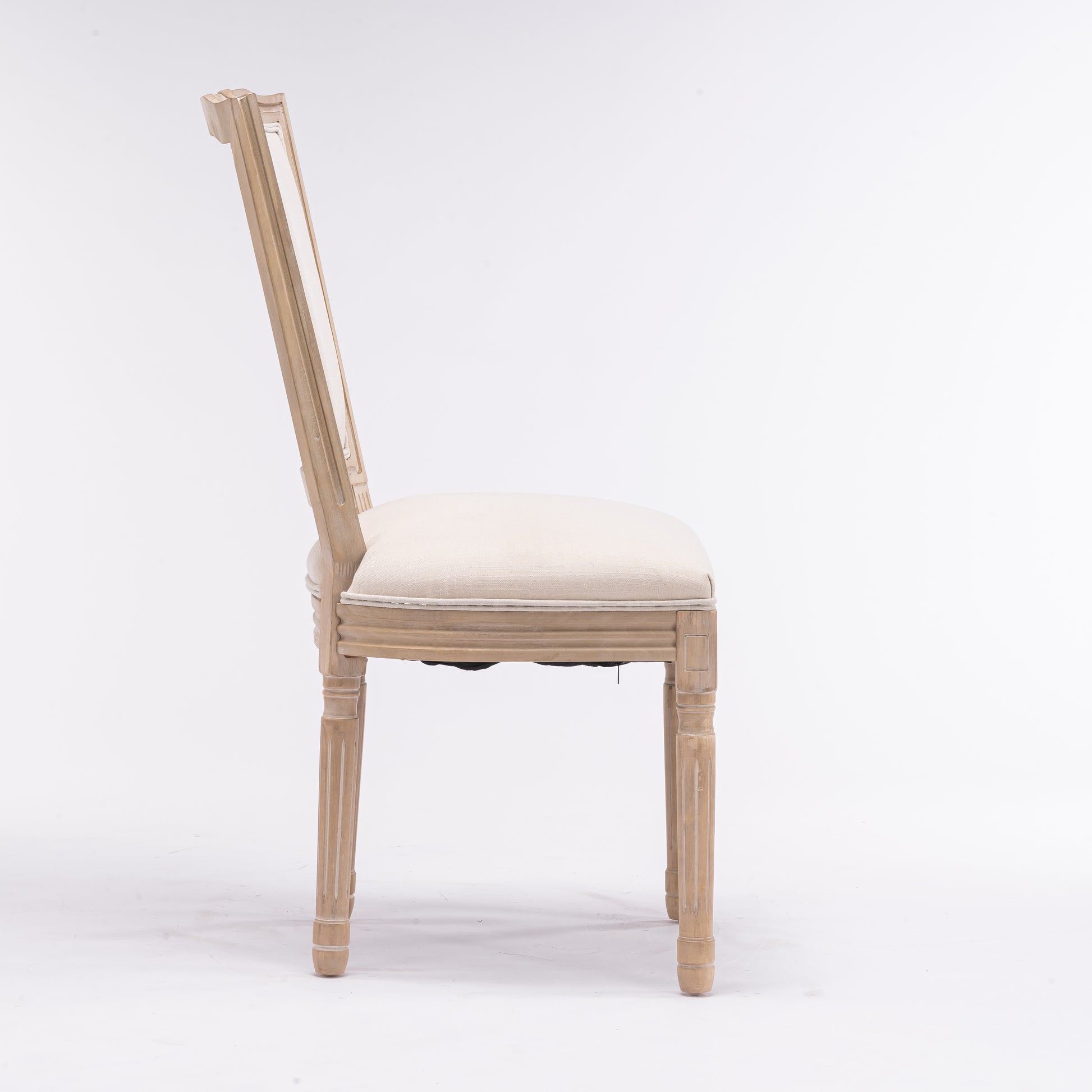 Classic distressed wood armchair with beige upholstered seat and back elegant dining chair