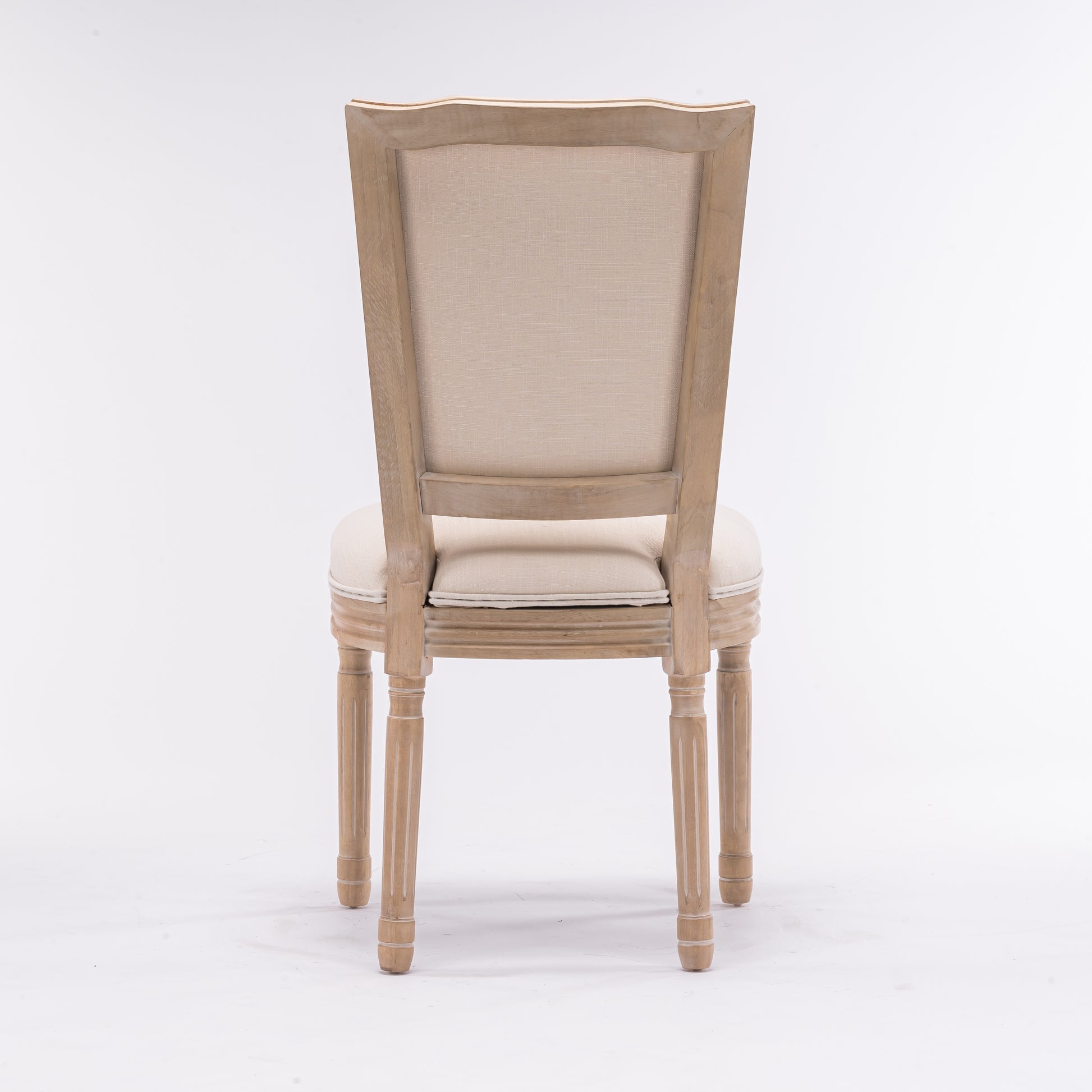 Elegant upholstered dining chair with light wood frame and beige fabric back