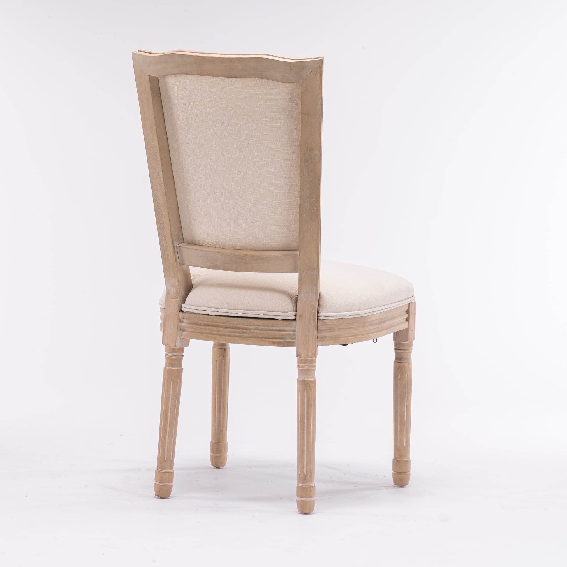 Elegant wooden dining chair with beige linen upholstery and carved legs