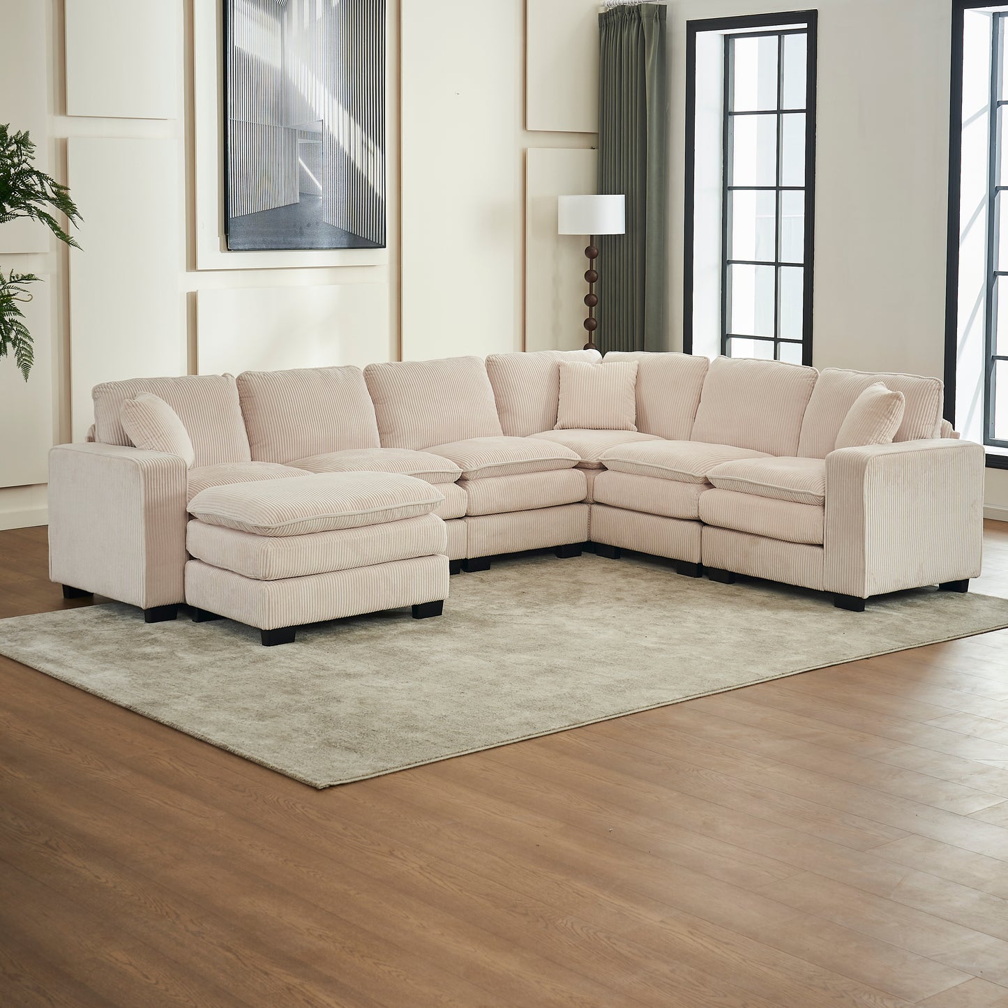 Plush corduroy sectional sofa in a soft pink hue ideal for a cozy living room