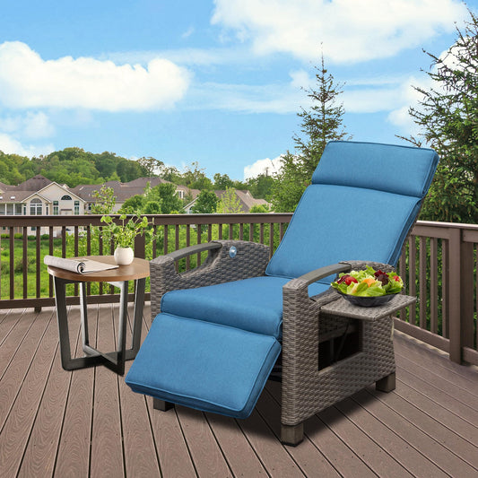 Blue wicker outdoor recliner with footrest extended and side table holding salad