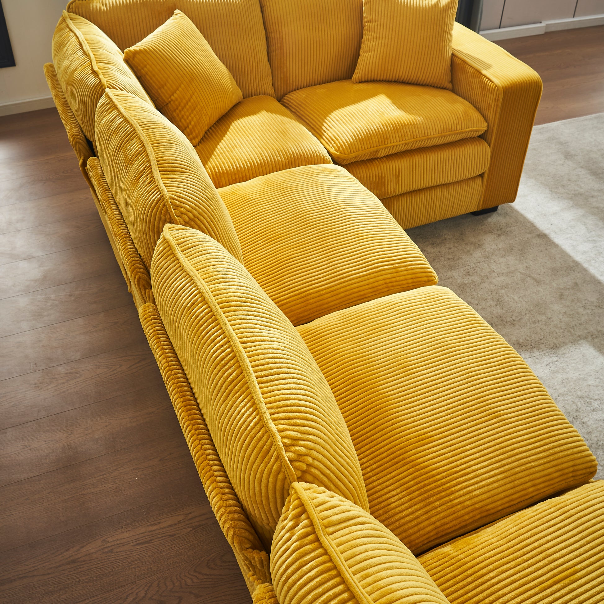 Plush yellow corduroy sectional sofa with deep cushions for ultimate comfort