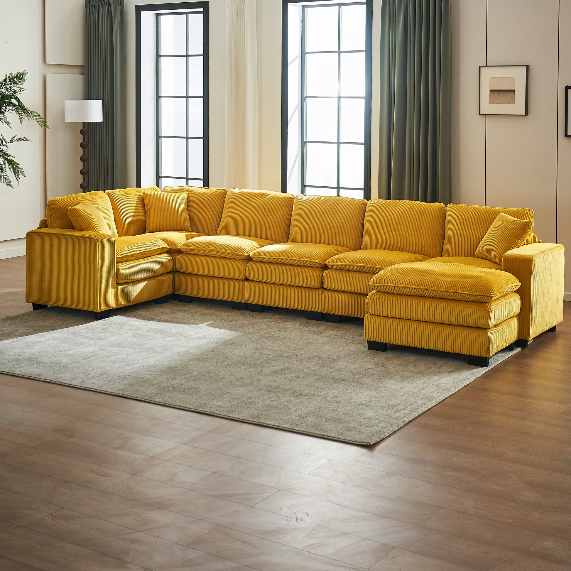 Spacious yellow corduroy sectional sofa with plush cushions and armrests perfect for modern living rooms