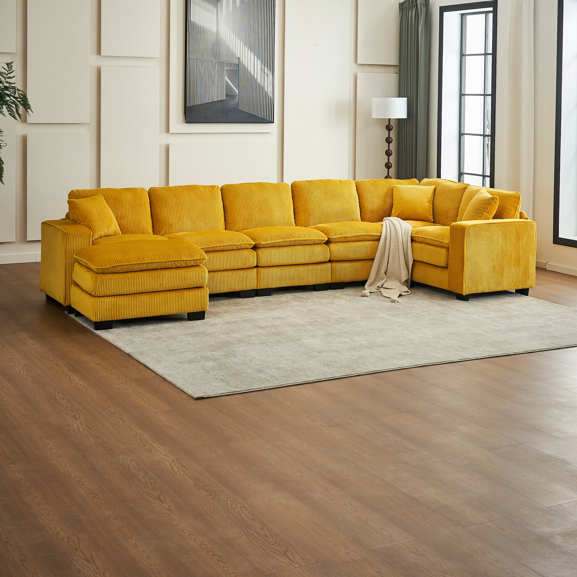 Yellow corduroy sectional sofa with deep cushions and ottoman perfect for family living rooms