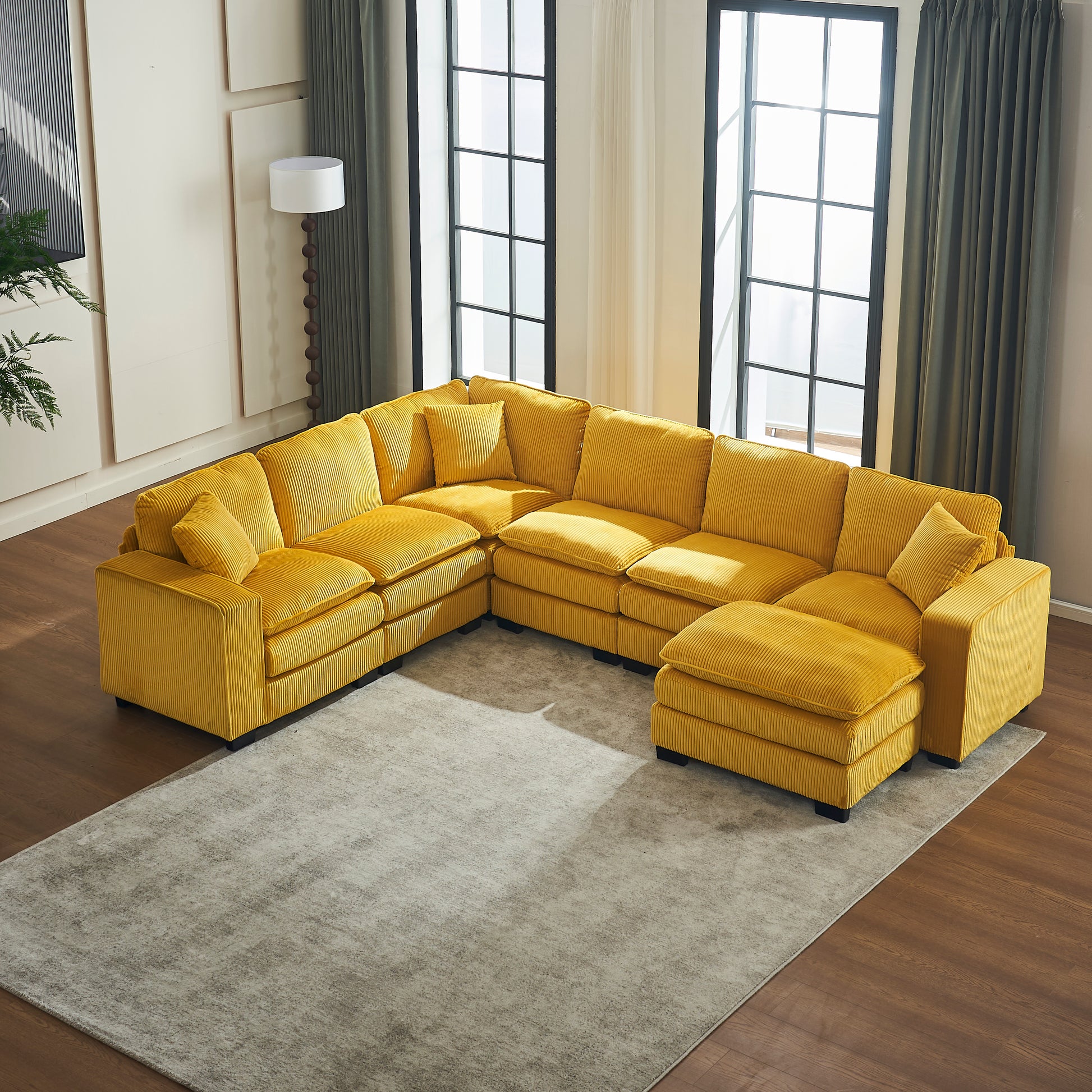 Yellow corduroy sectional sofa with plush cushions and armrests perfect for modern living rooms