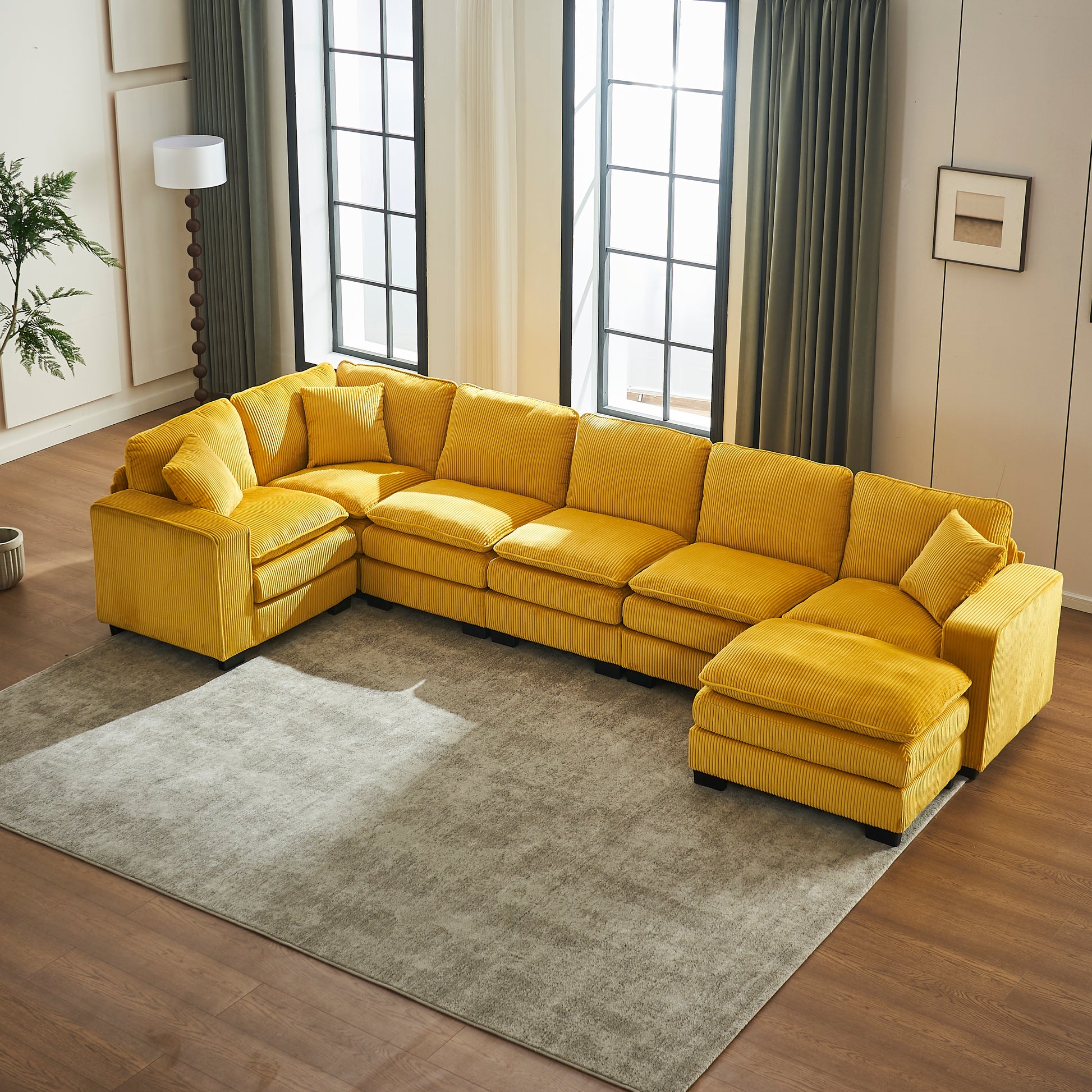 Yellow corduroy sectional sofa with multiple throw pillows for living room comfort