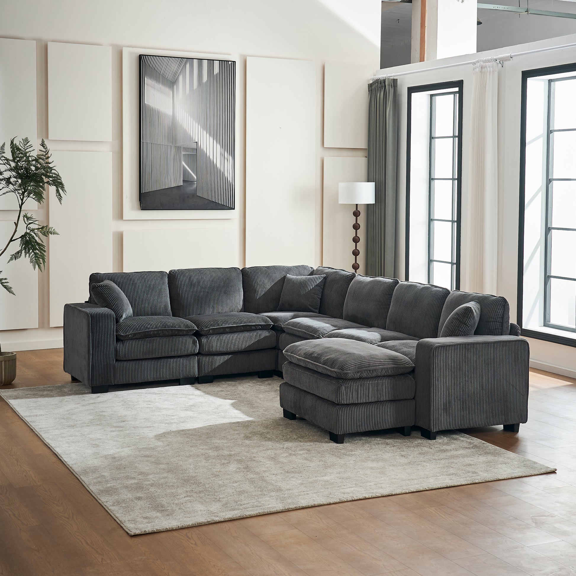 Dark gray corduroy sectional sofa with chaise lounge perfect for modern living rooms