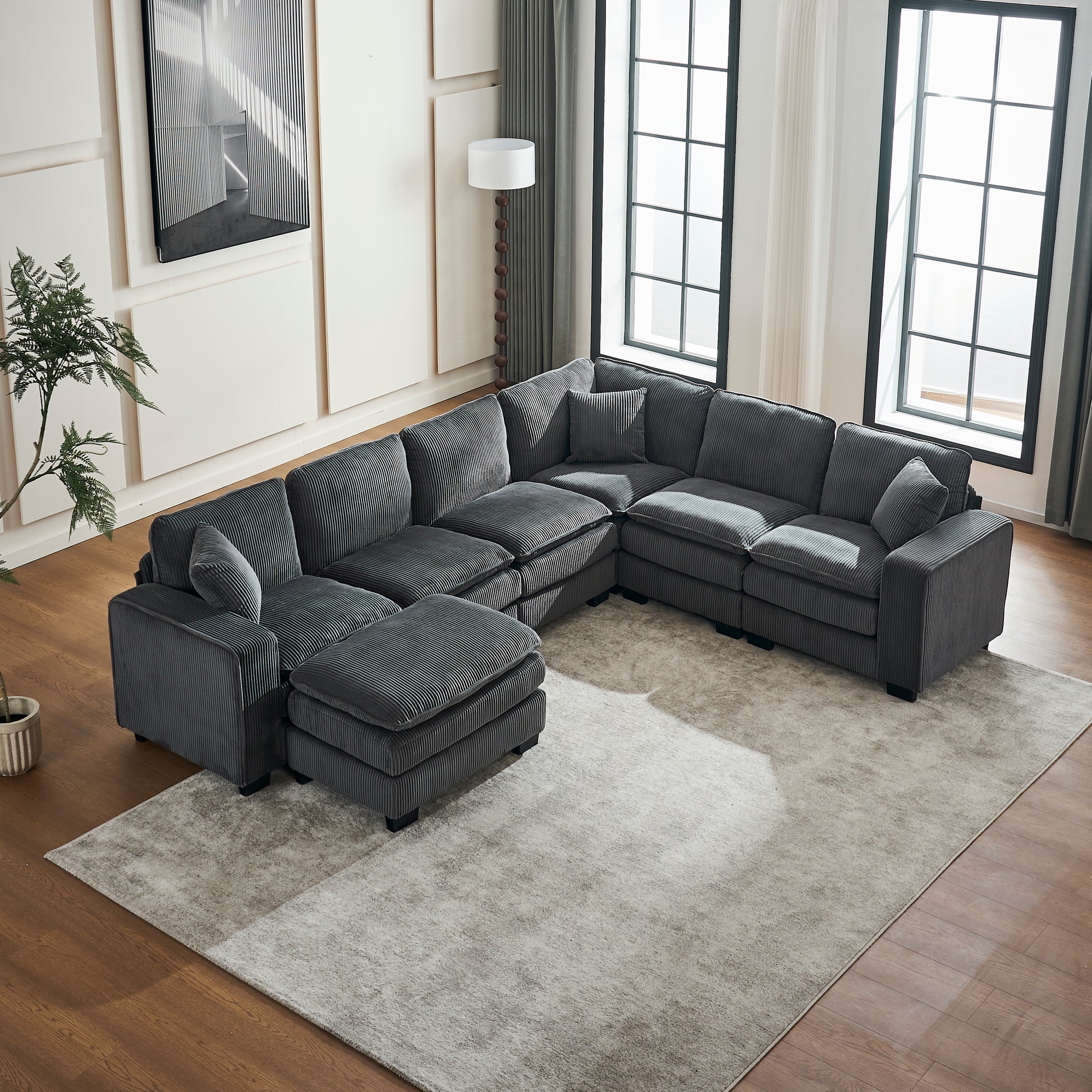 Dark grey corduroy sectional sofa with ottoman for living room comfort