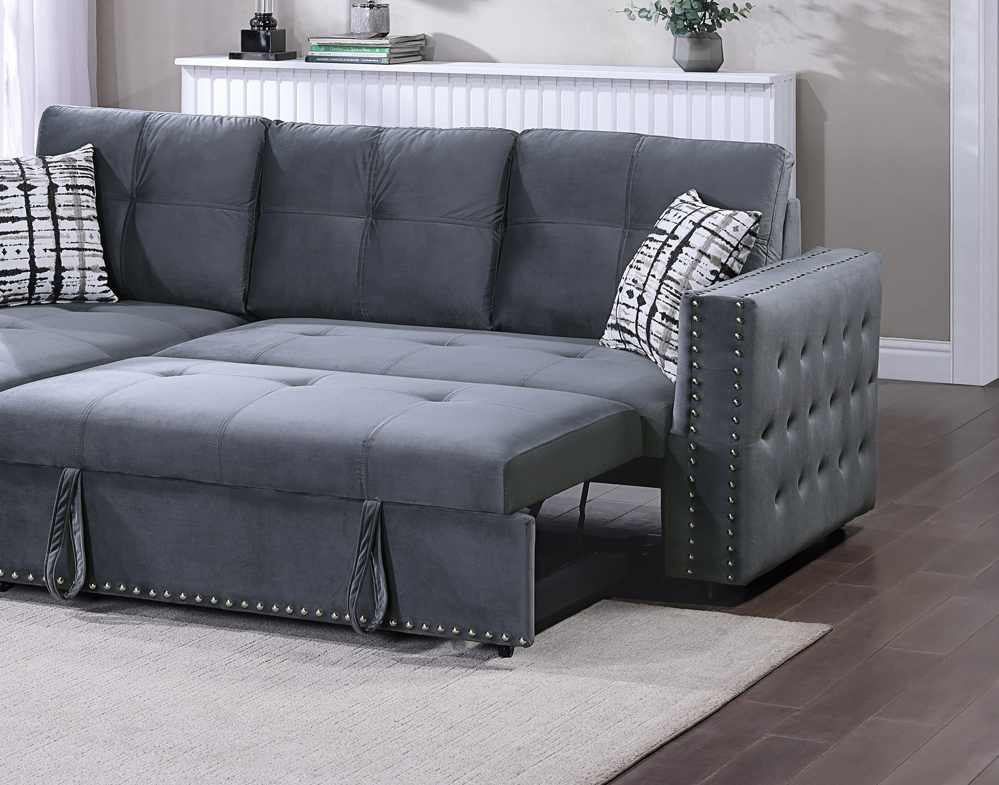 Dark grey velvet sectional sofa with tufted armrest and pullout bed feature modern living room furniture