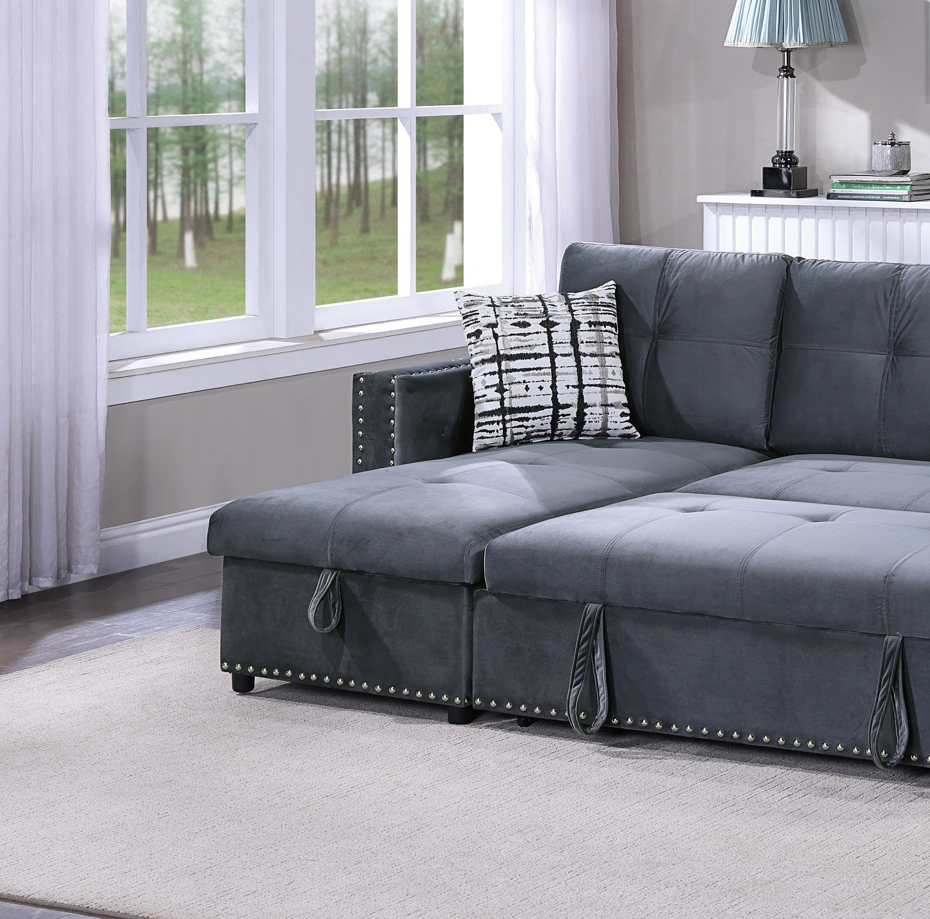 Tufted charcoal gray velvet sectional sofa with hidden storage and decorative nailhead trim