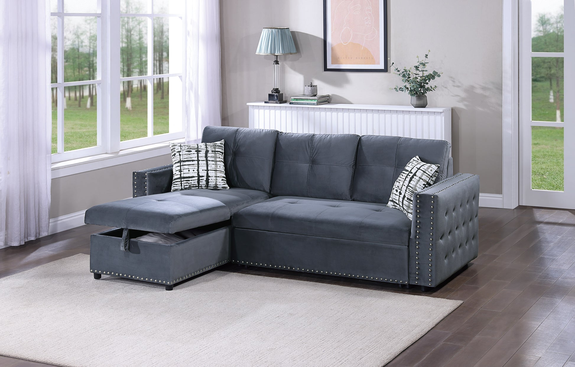 Dark gray velvet sectional sofa with storage chaise and nailhead trim accents