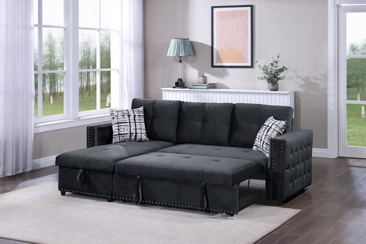 Dark gray velvet sectional sofa bed with tufted details and studded trim featuring pullout mattress section