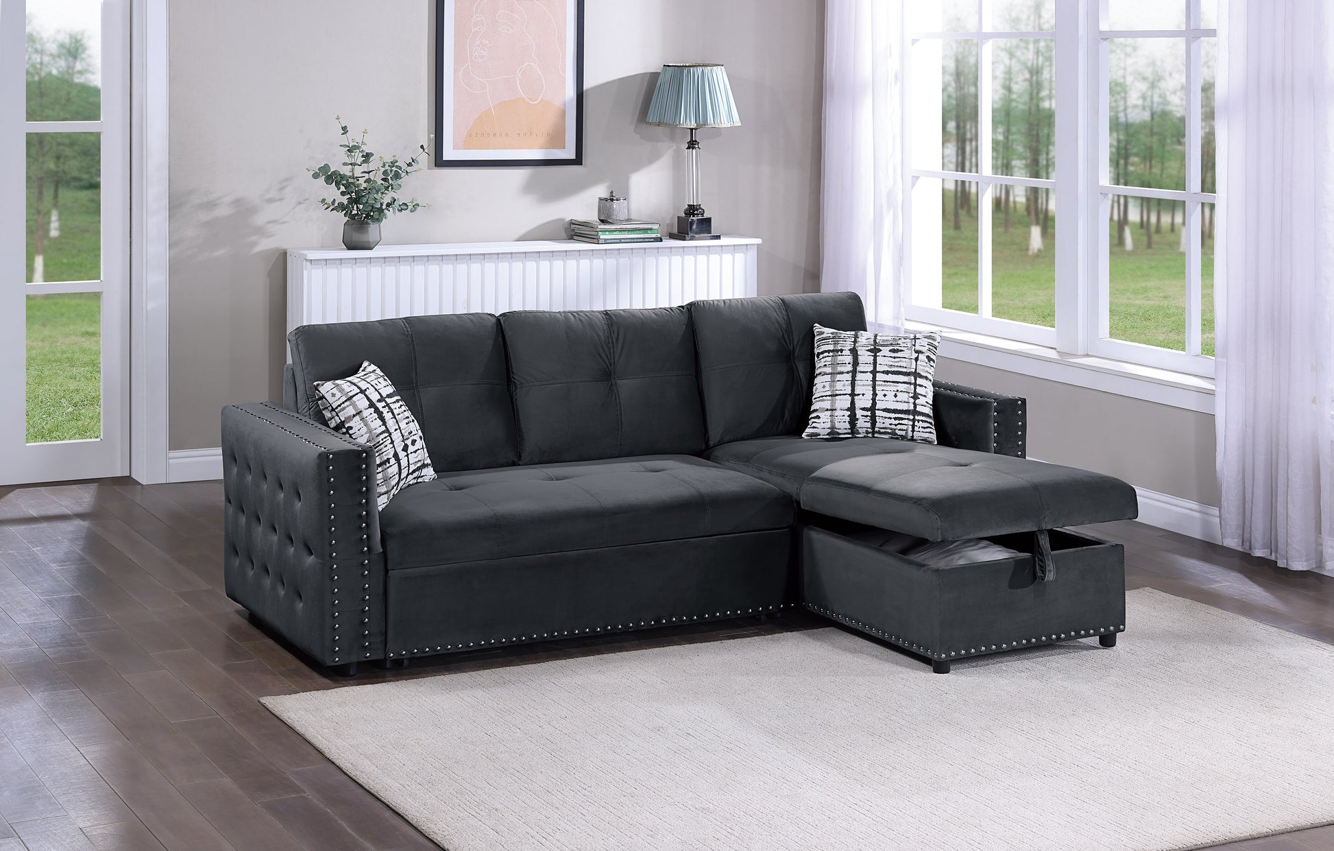 Dark grey velvet sectional sofa with storage chaise and stud accents