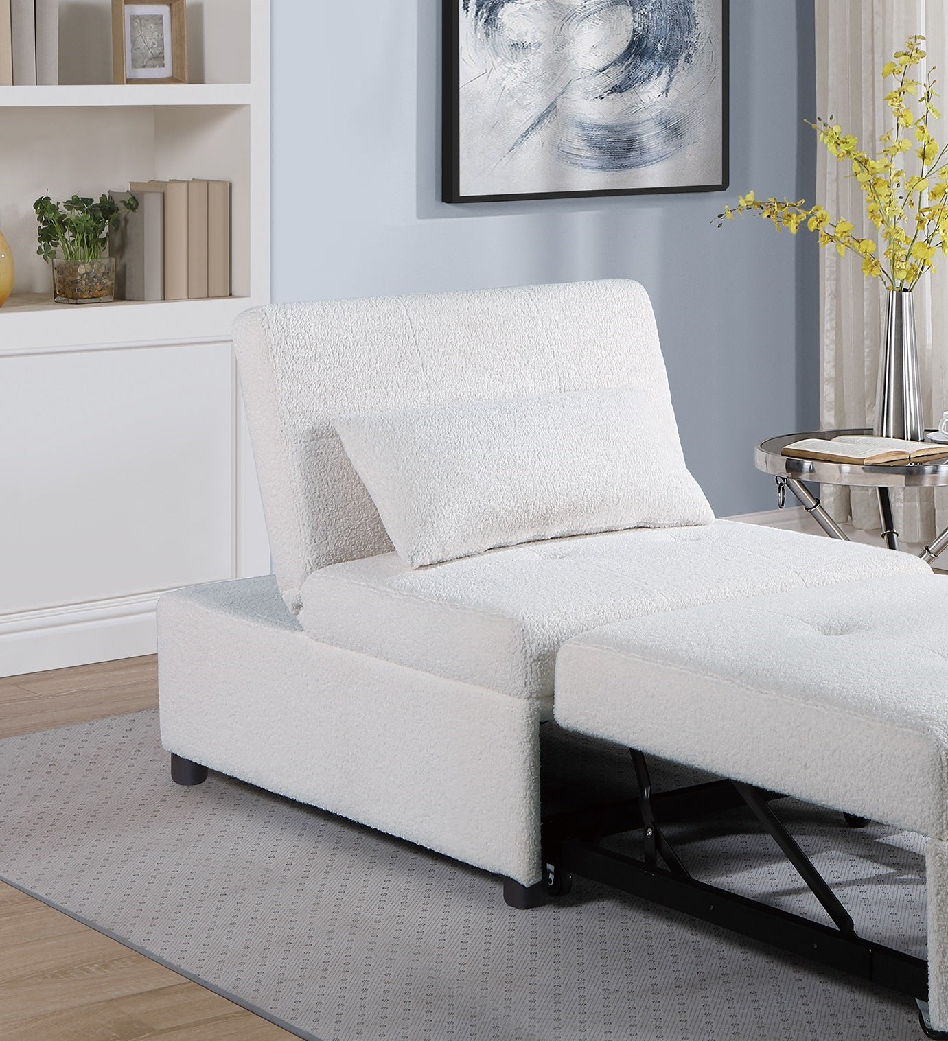 White textured fabric convertible chair with extended ottoman and black metal mechanism