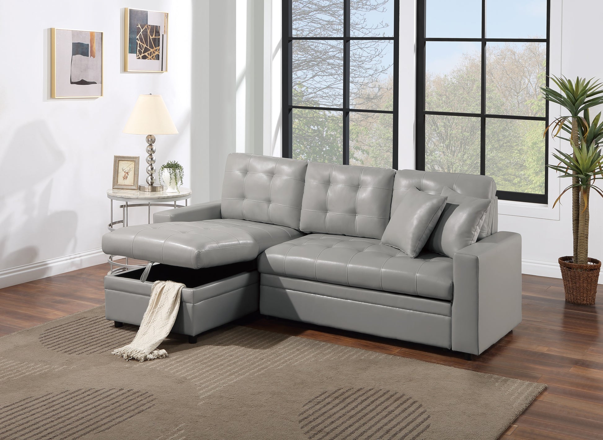 Gray faux leather sectional sofa with tufted cushions and hidden storage compartment