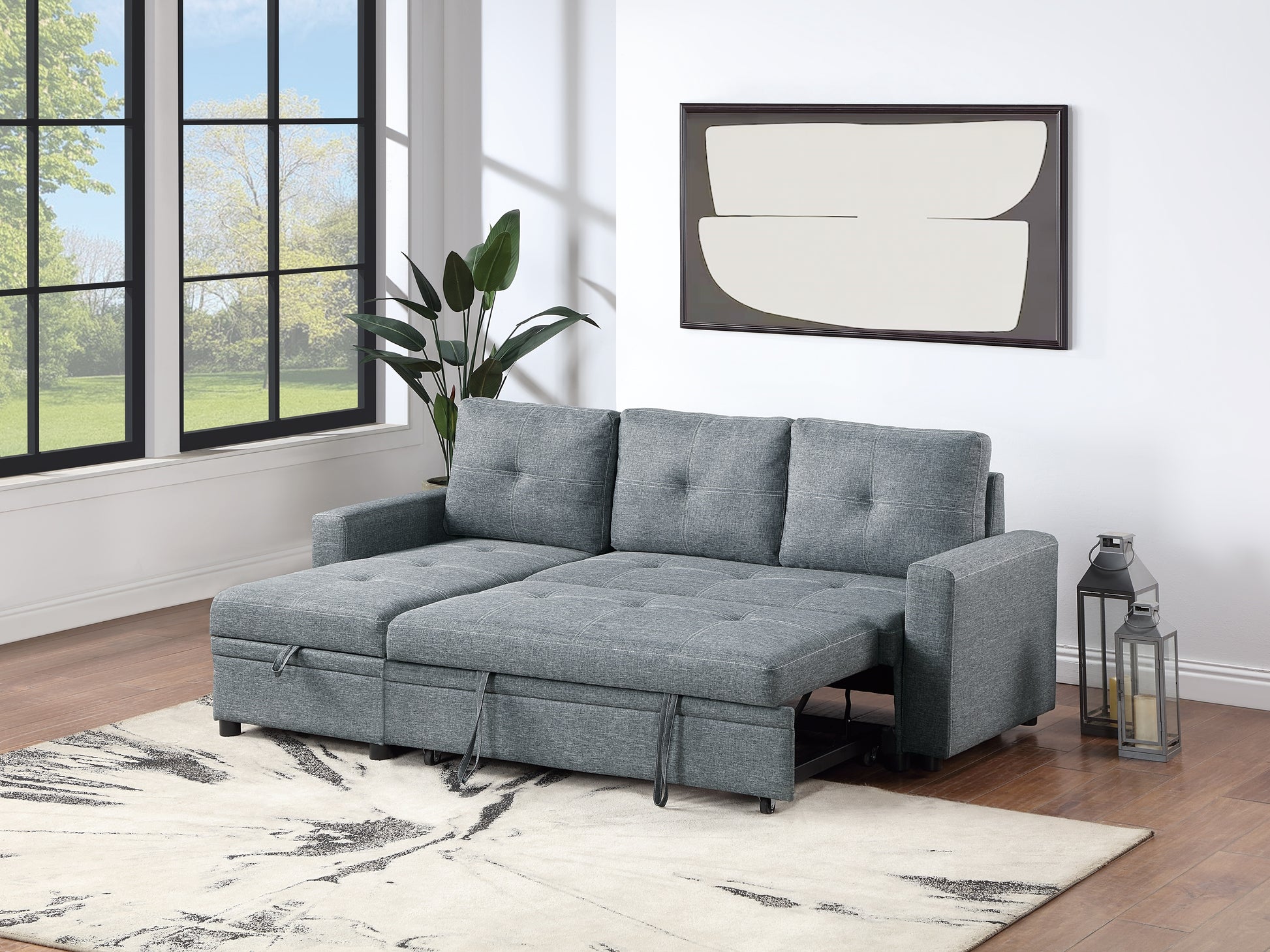 Gray fabric sectional sofa bed with tufted cushions and storage chaise