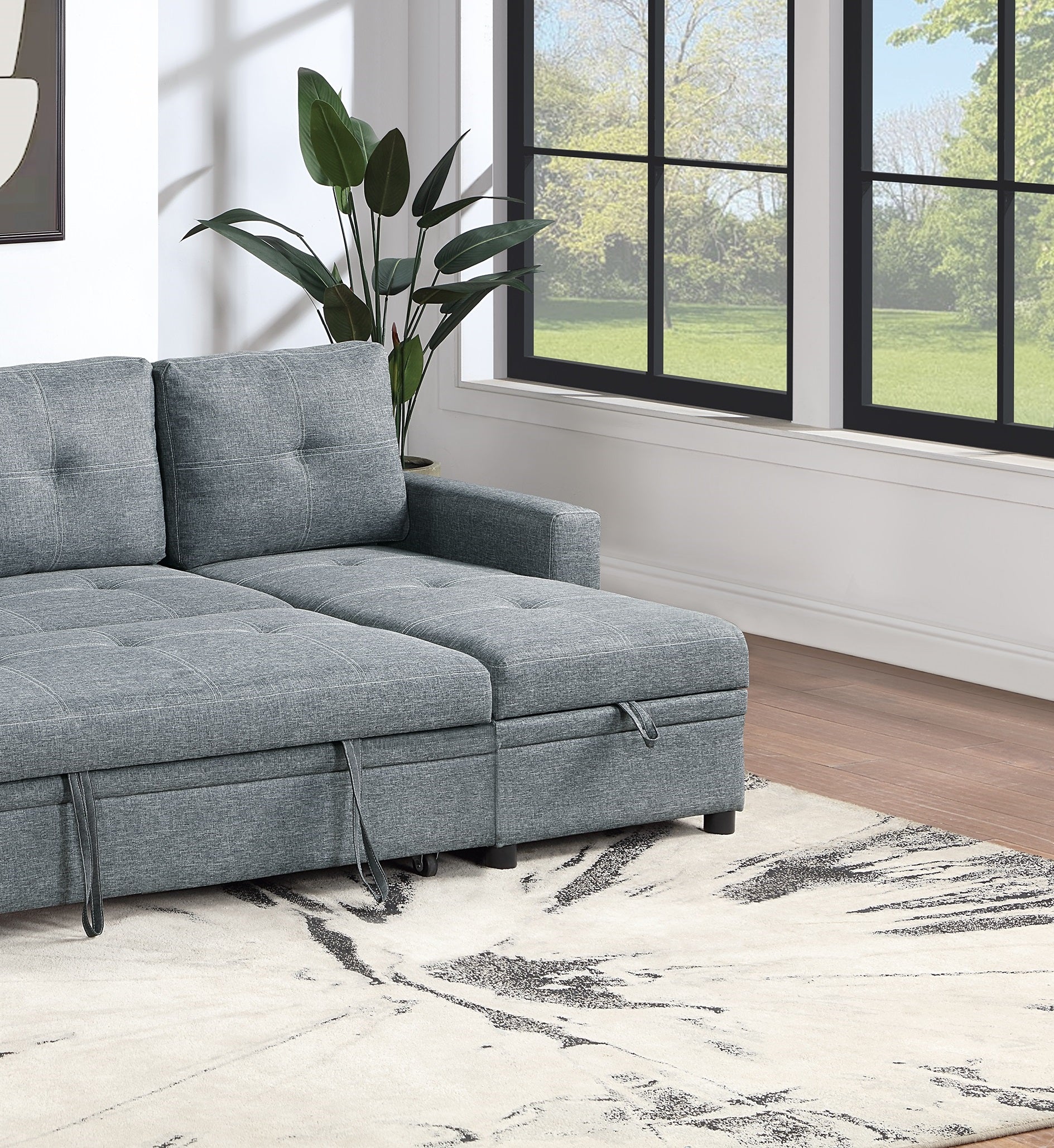 Grey sectional sofa with tufted cushions and storage ottoman for living room seating