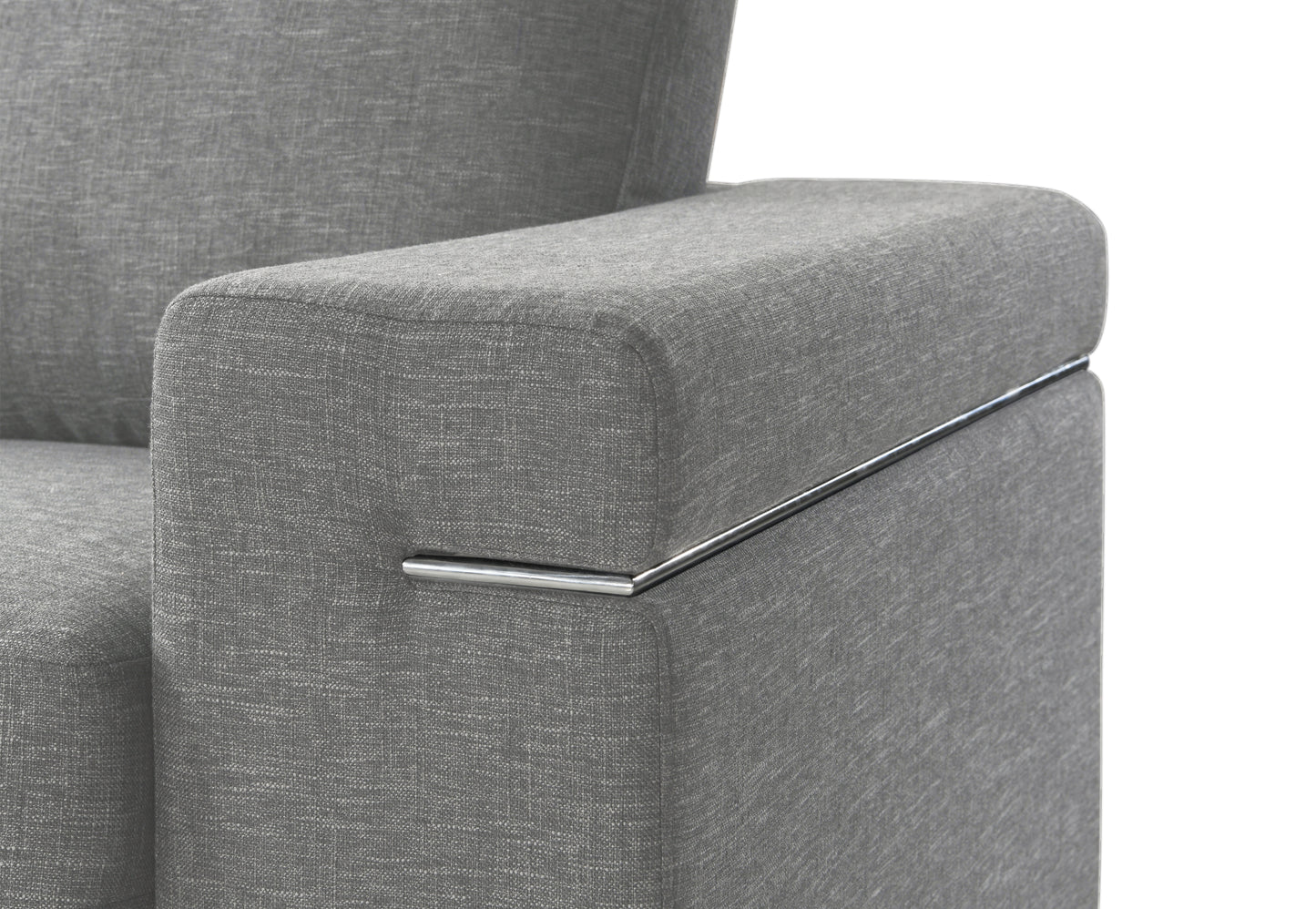 Closeup of a grey textured fabric sofa armrest with a polished chrome accent strip